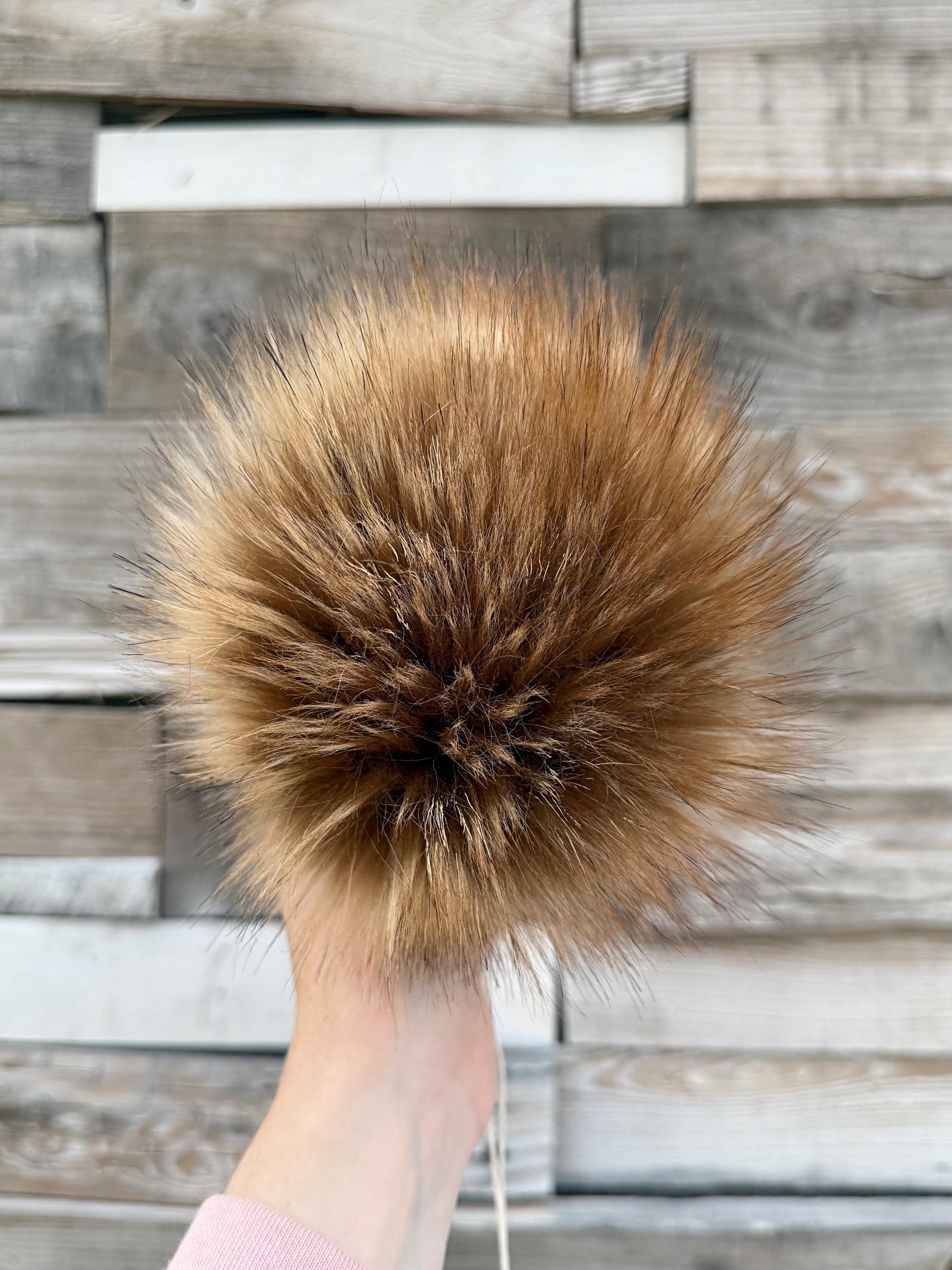 Large brown fur pom-pom for beanies 
