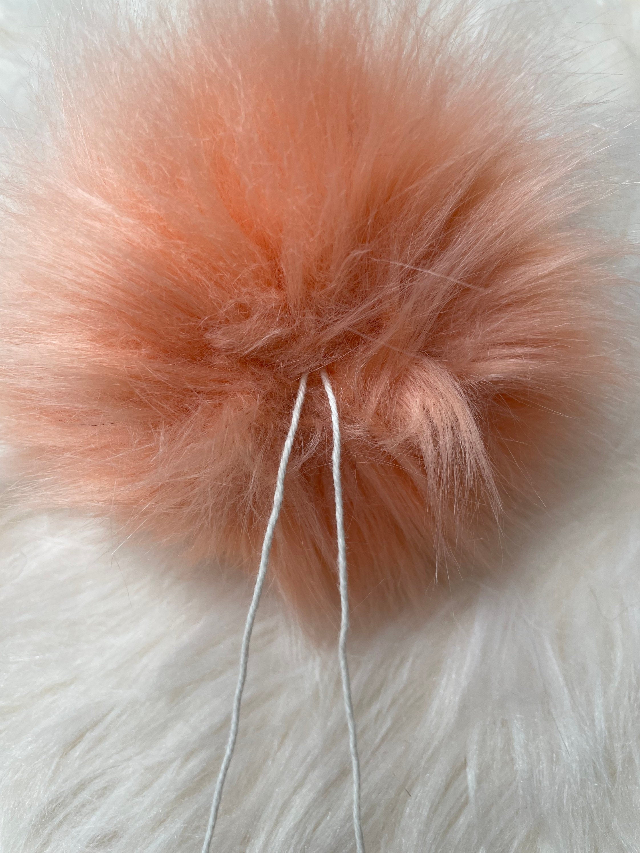 Mango faux fur pom pom