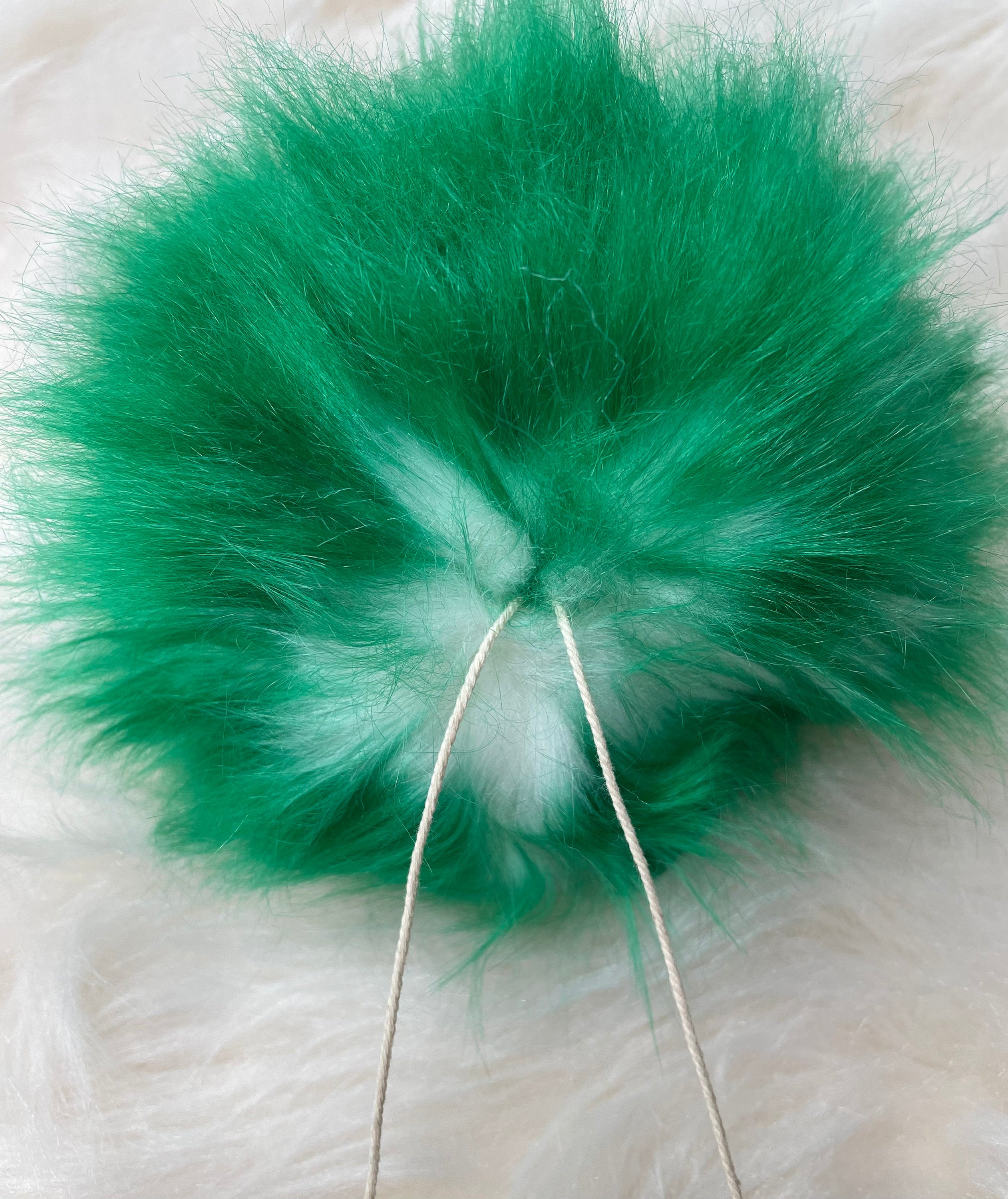 White with green tips faux fur Pom Pom