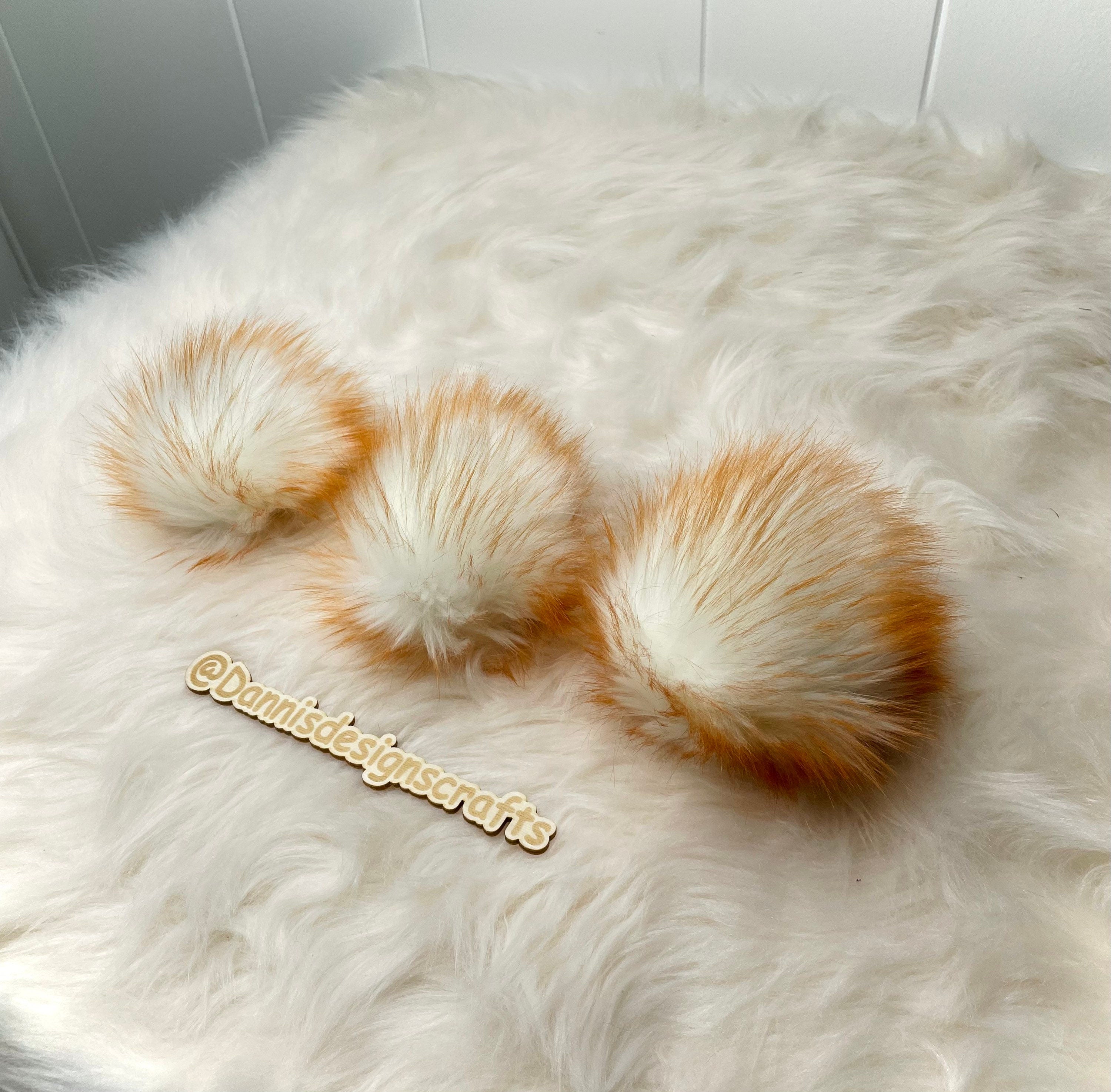 Amber Faux fur Pom Pom