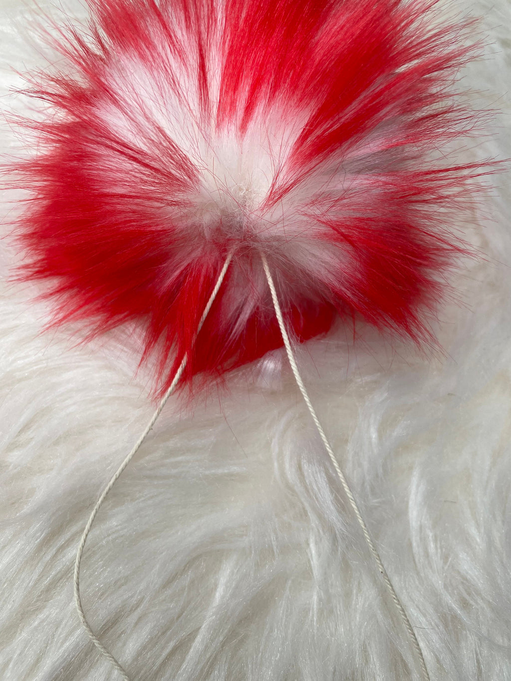 White with red tips faux fur Pom Pom