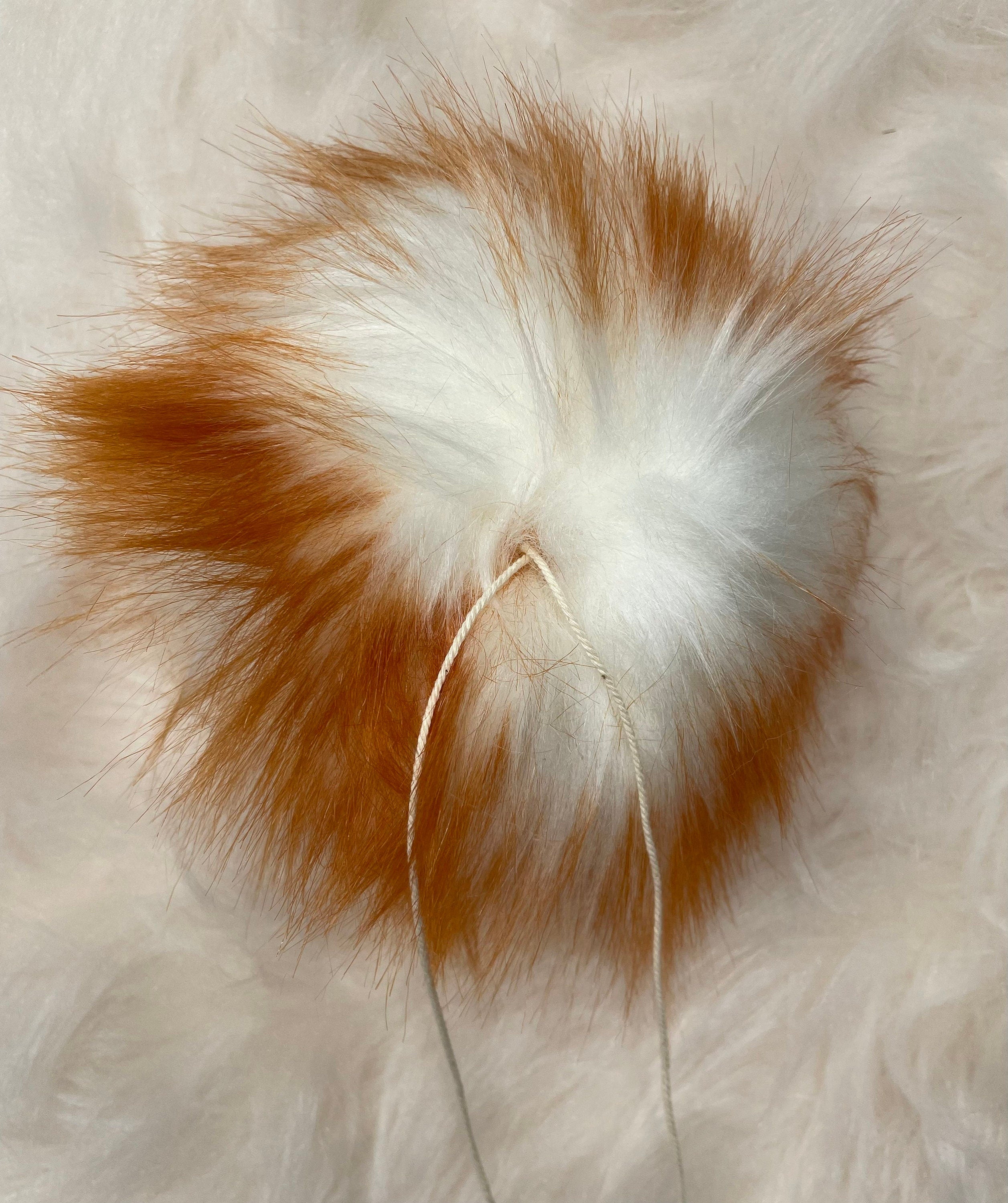 Amber Faux fur Pom Pom