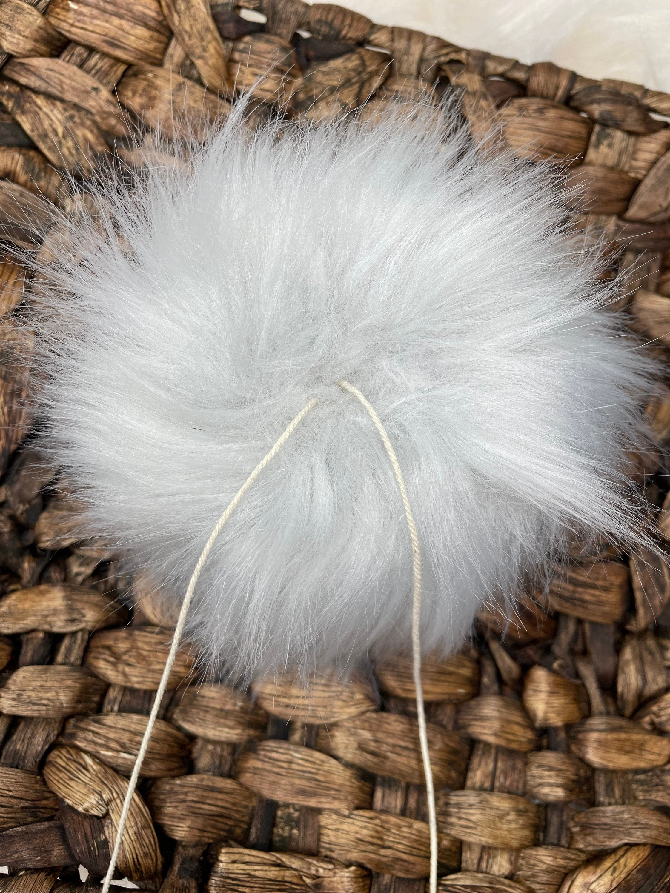 Platinum Mongolian Faux fur Pom Pom