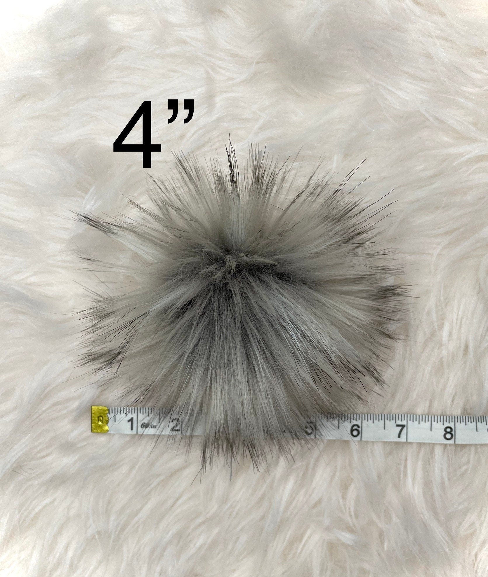 Grey wolf faux fur pom pom