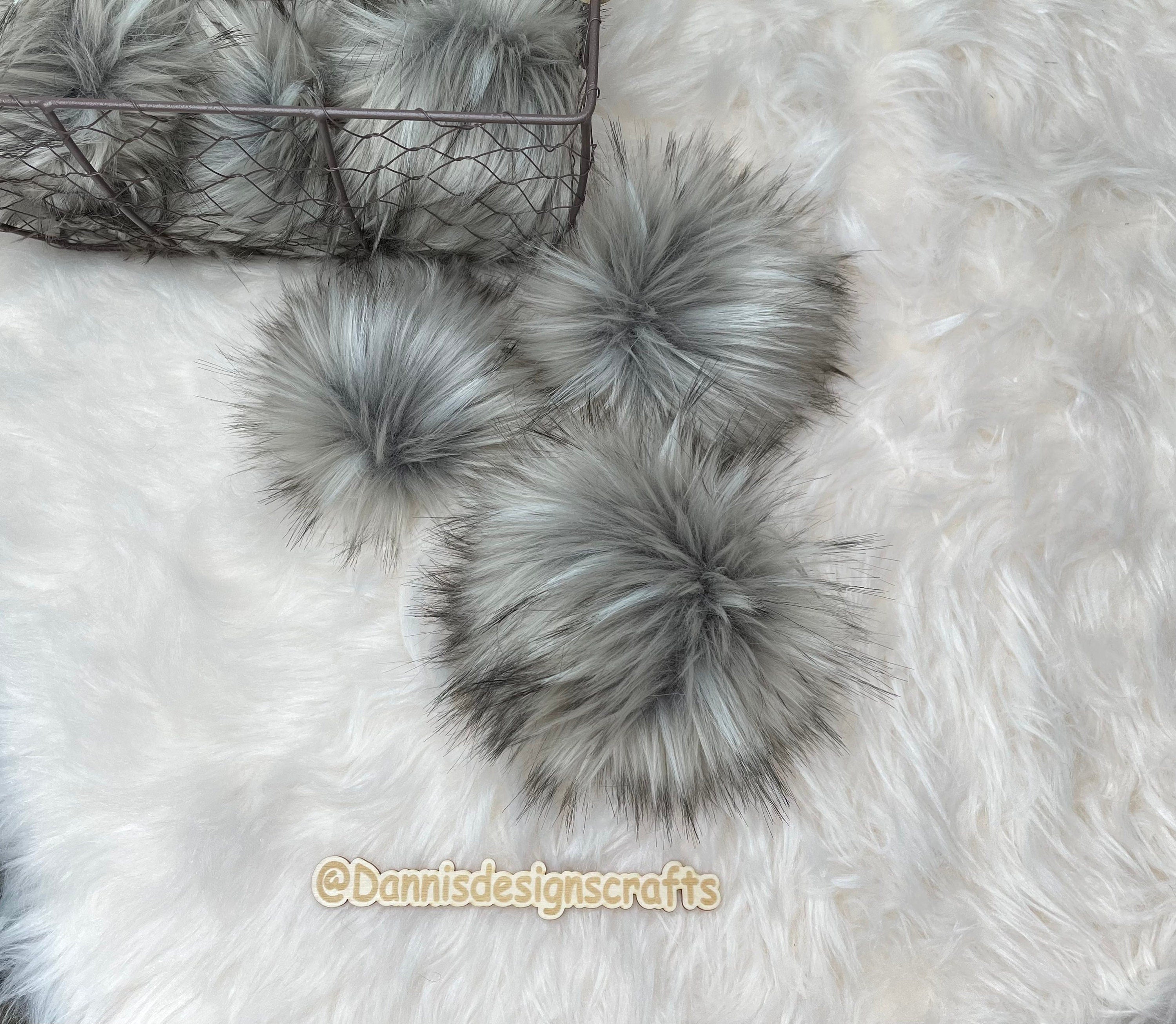 Grey wolf faux fur pom pom
