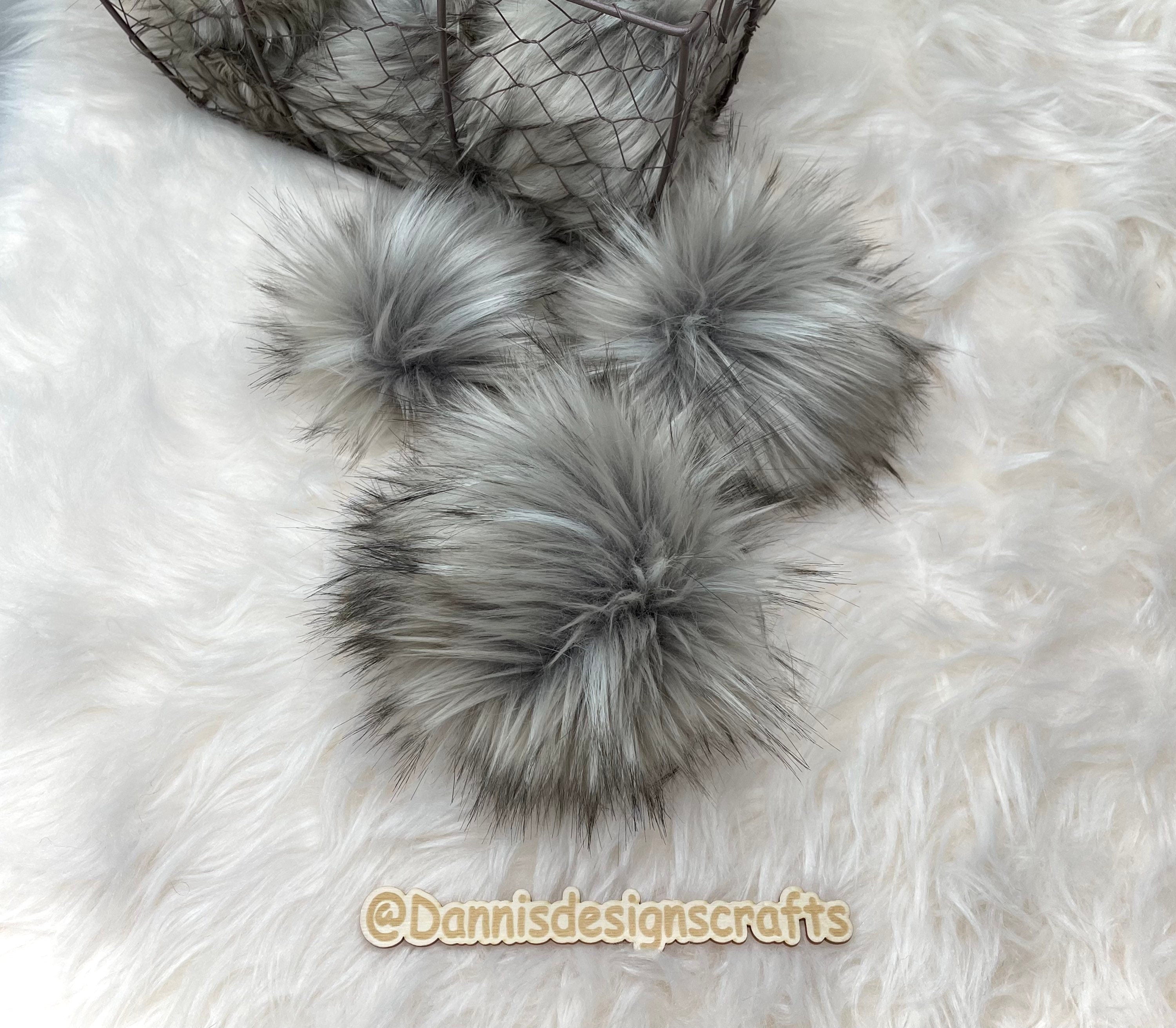 Grey wolf faux fur pom pom