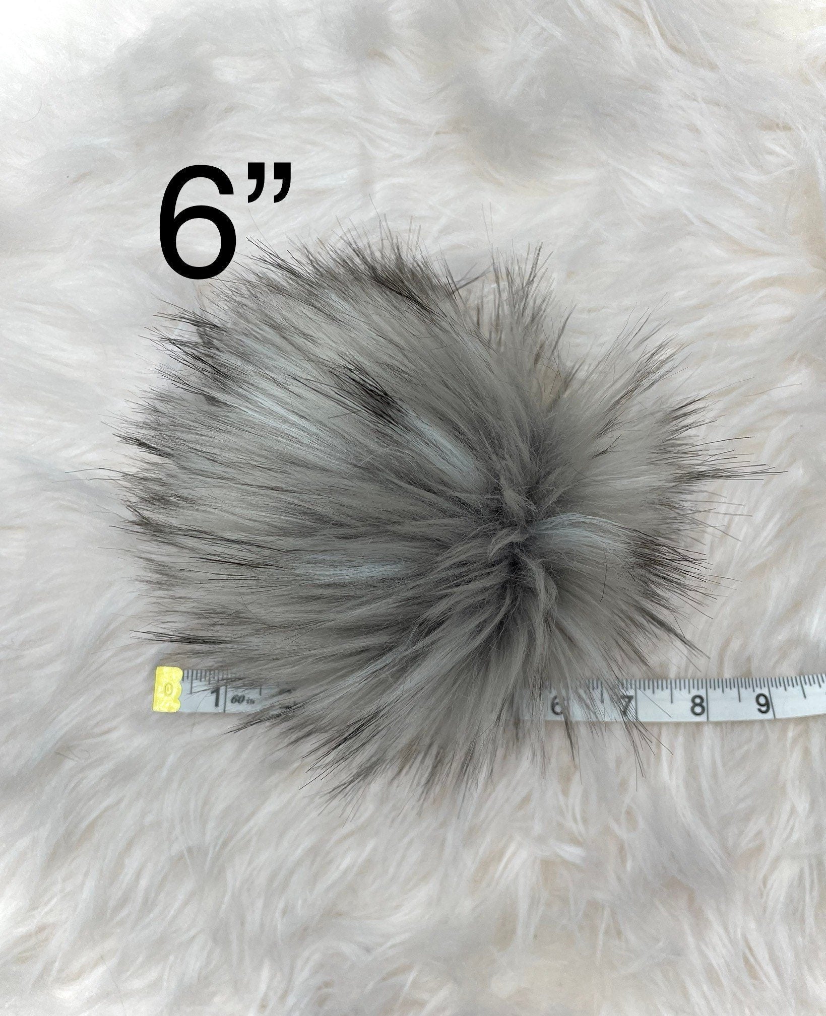 Grey wolf faux fur pom pom