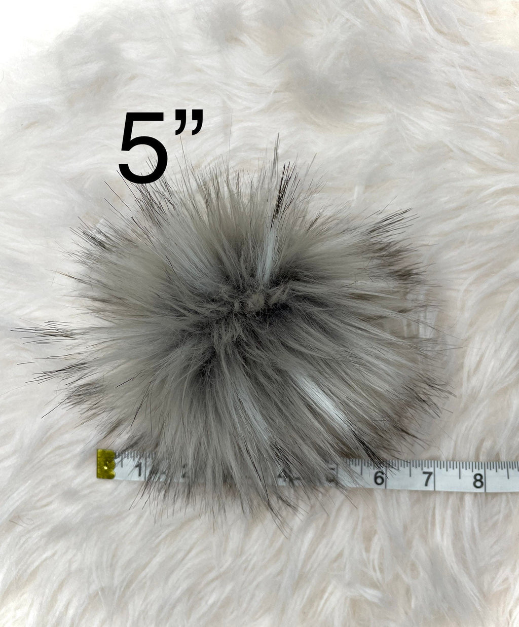 Grey wolf faux fur pom pom