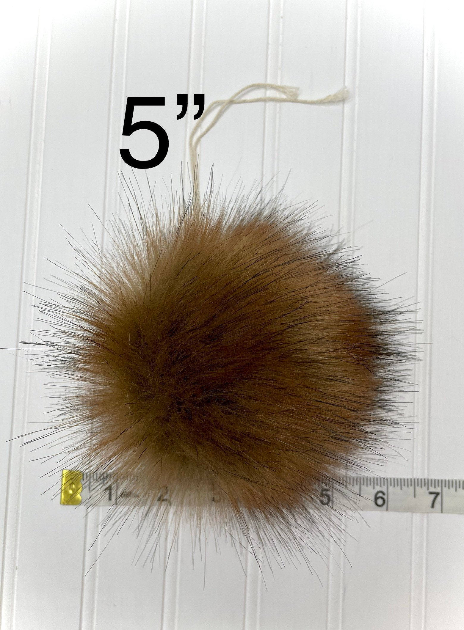 Arabian wolf faux fur pom pom