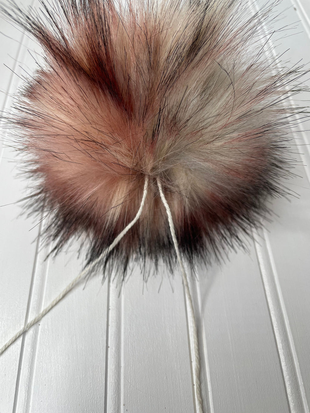 Apollo wolf pink faux fur Pom Pom