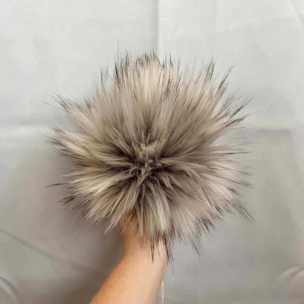 Grey wolf faux fur pom pom