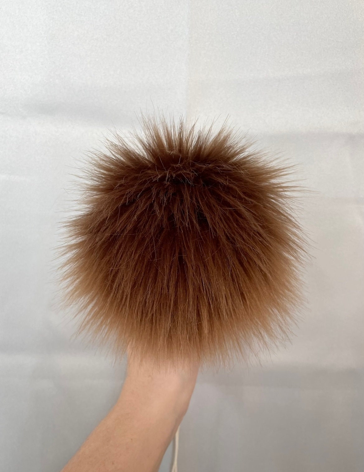 Chocolate faux fur pom pom
