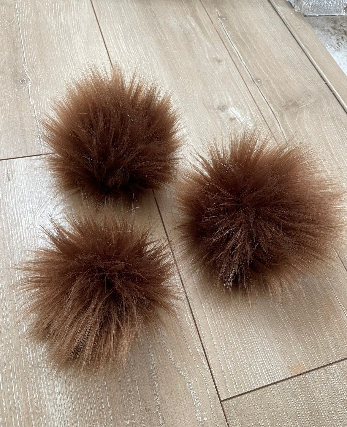 Chocolate faux fur pom pom