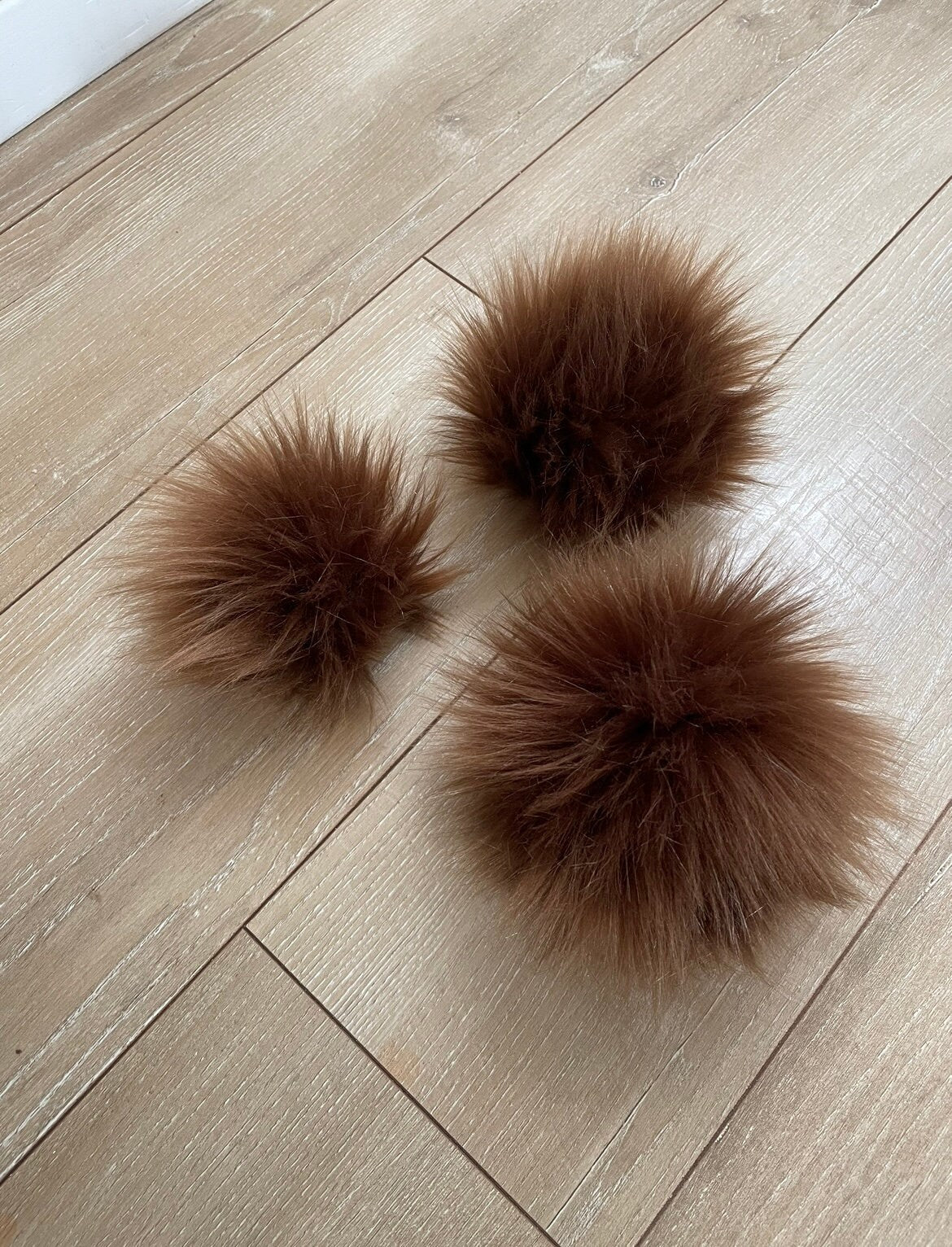 Chocolate faux fur pom pom
