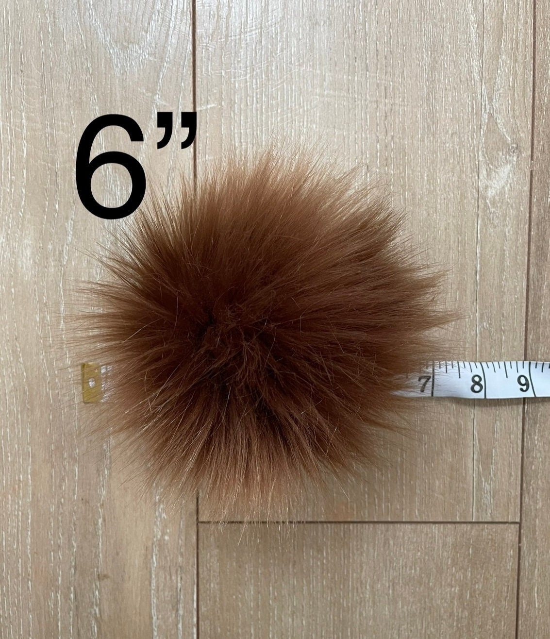Chocolate faux fur pom pom