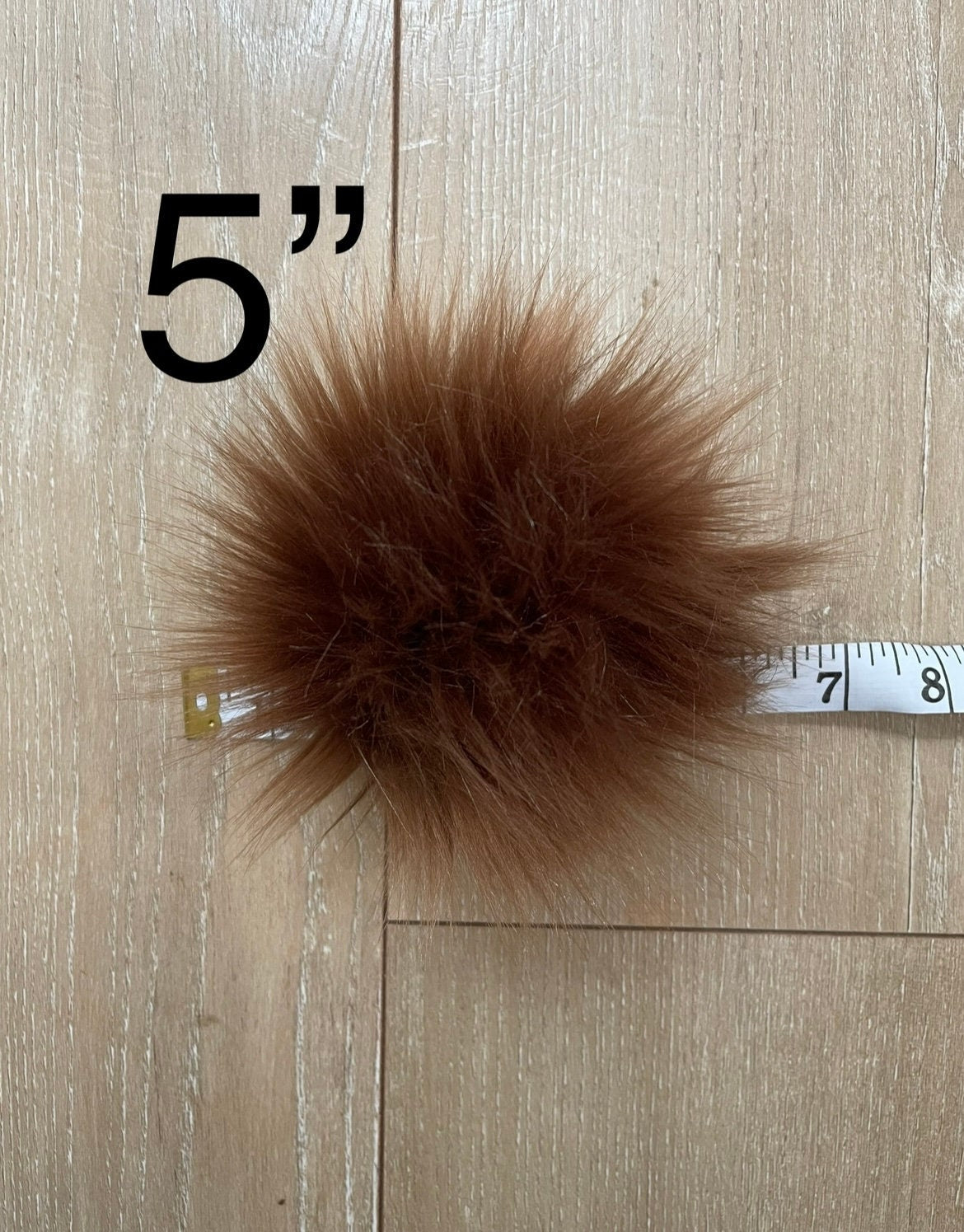 Chocolate faux fur pom pom