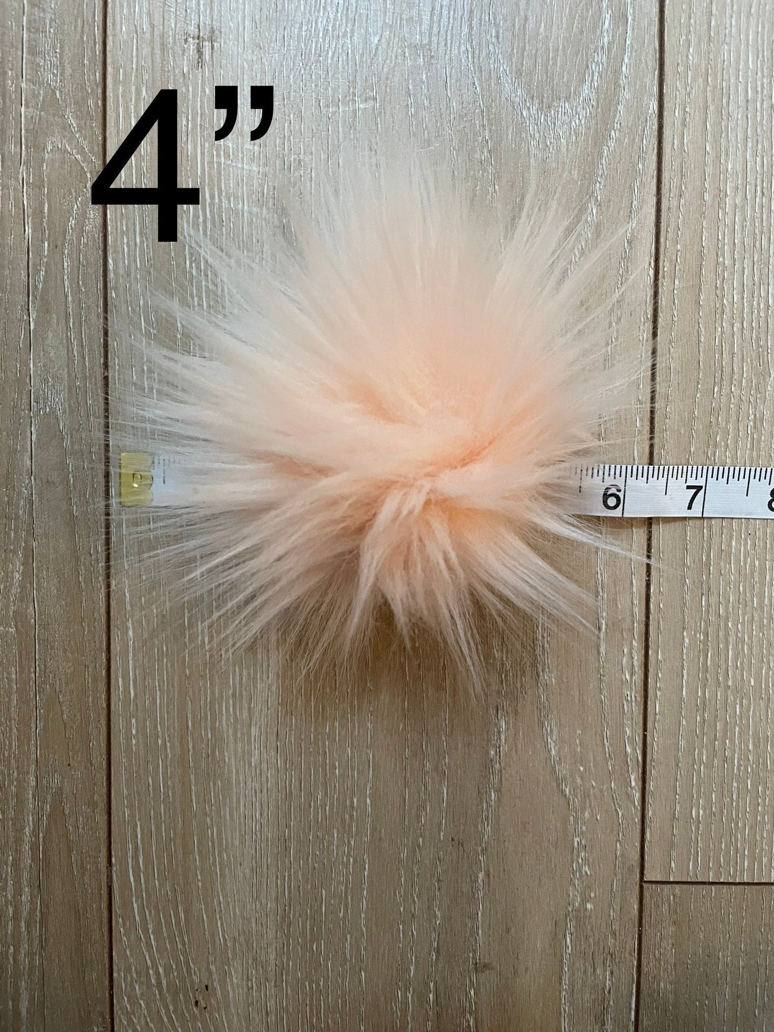 Peachy faux fur Pom Pom