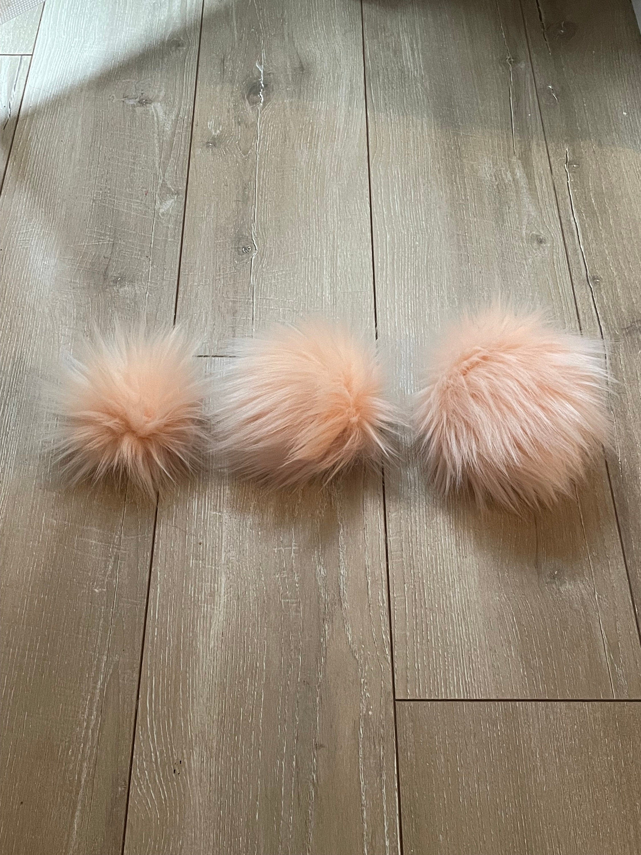 Peachy faux fur Pom Pom