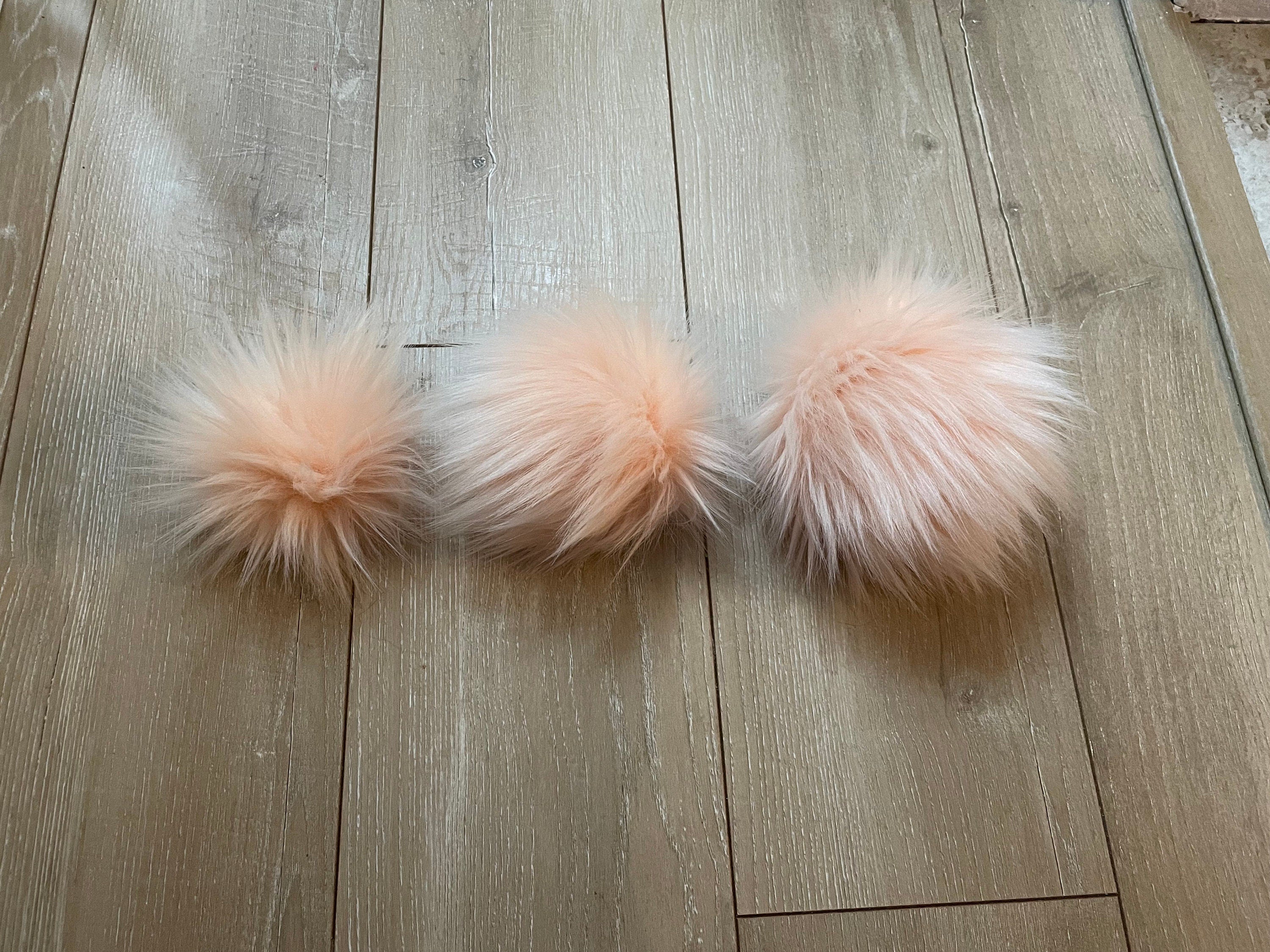 Peachy faux fur Pom Pom