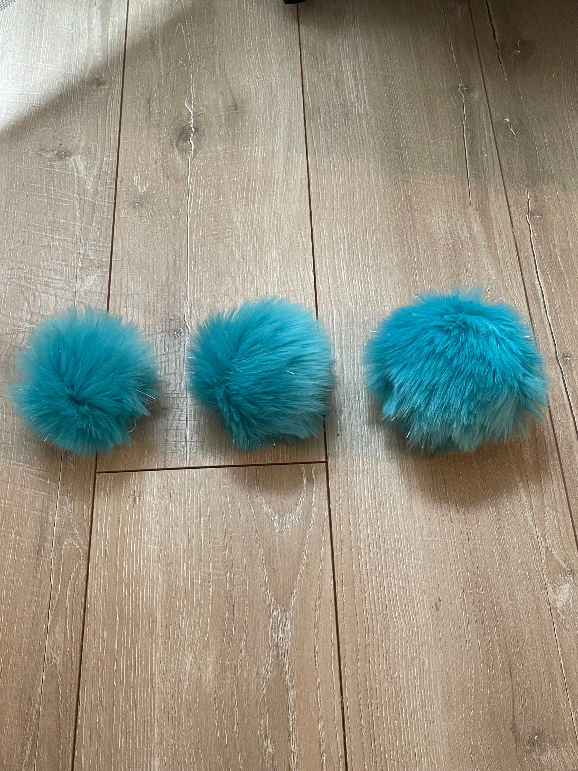 Turquoise tinsel Pom Pom