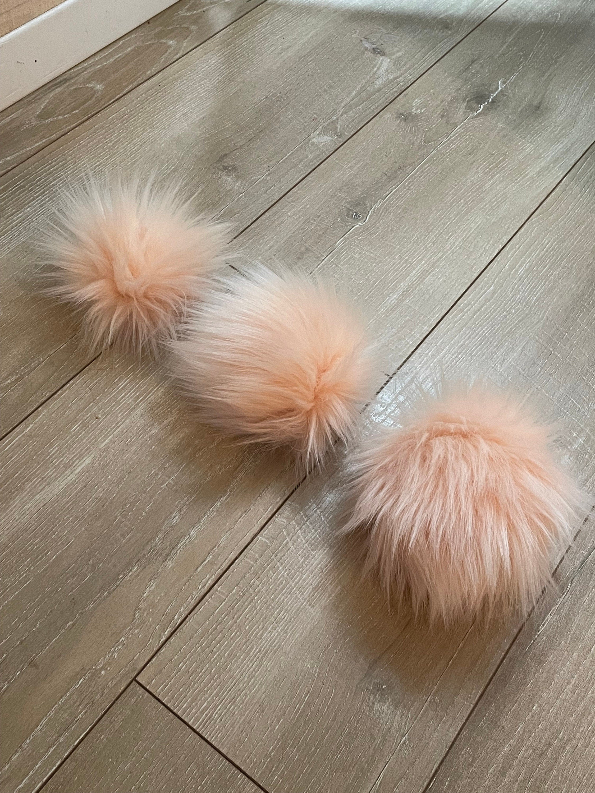 Peachy faux fur Pom Pom