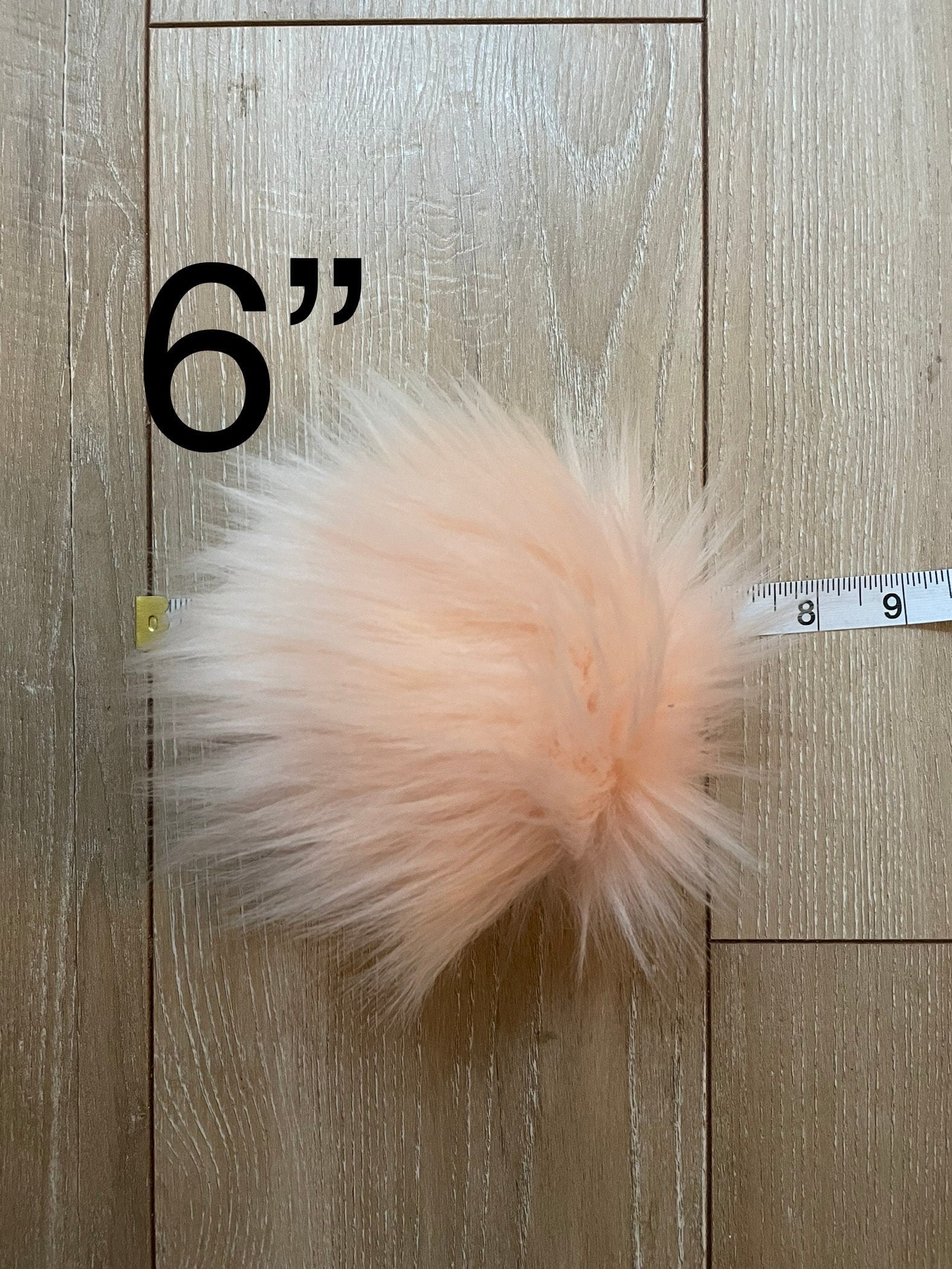 Peachy faux fur Pom Pom