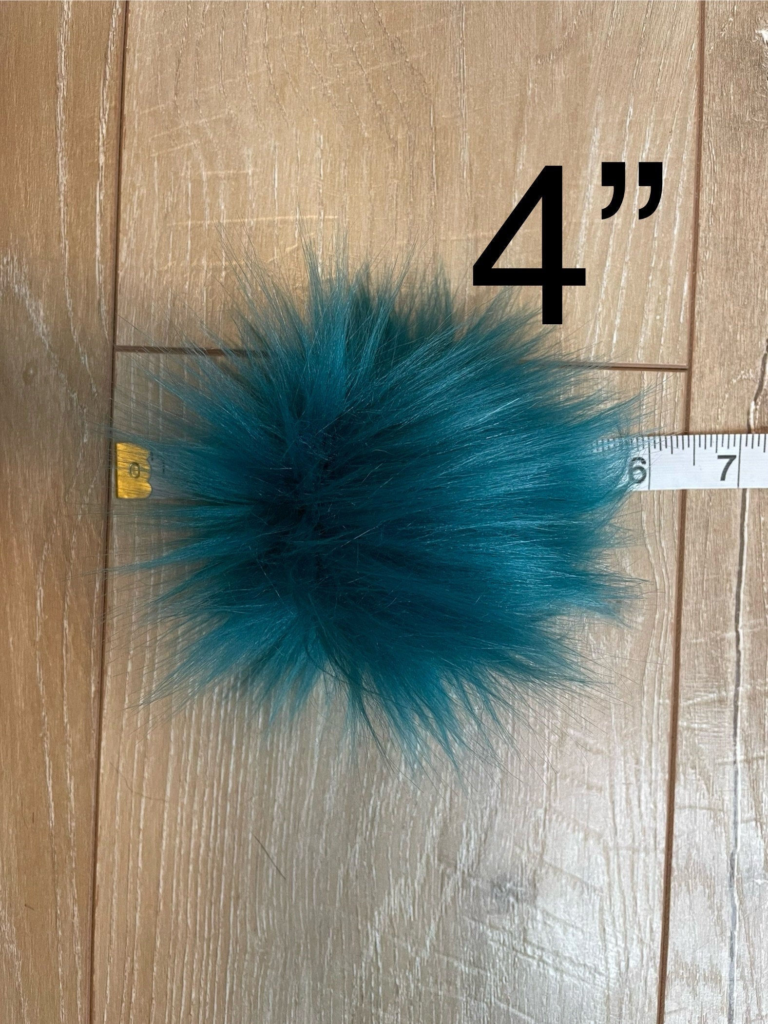 Teal faux fur Pom Poms