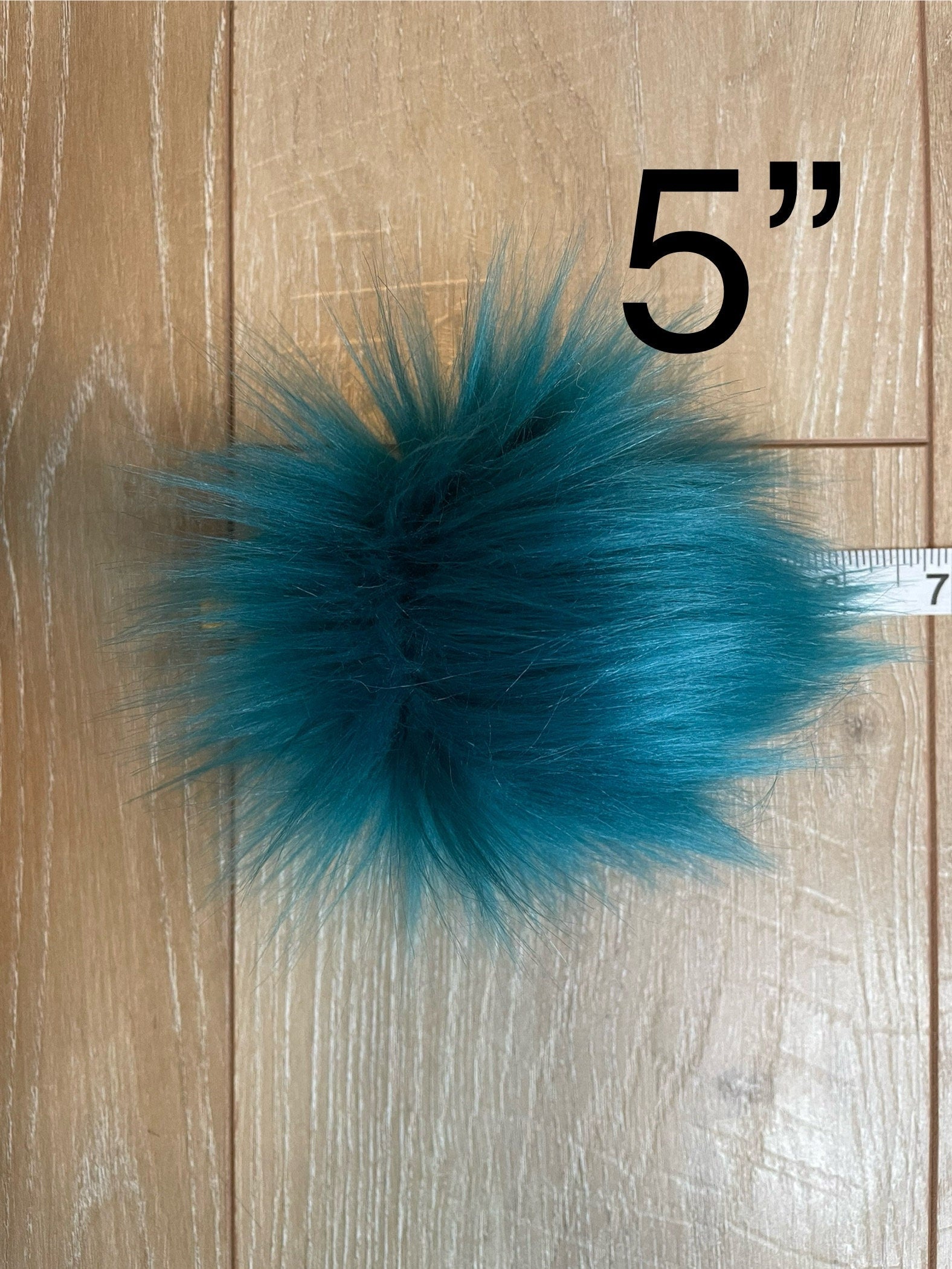 Teal faux fur Pom Poms