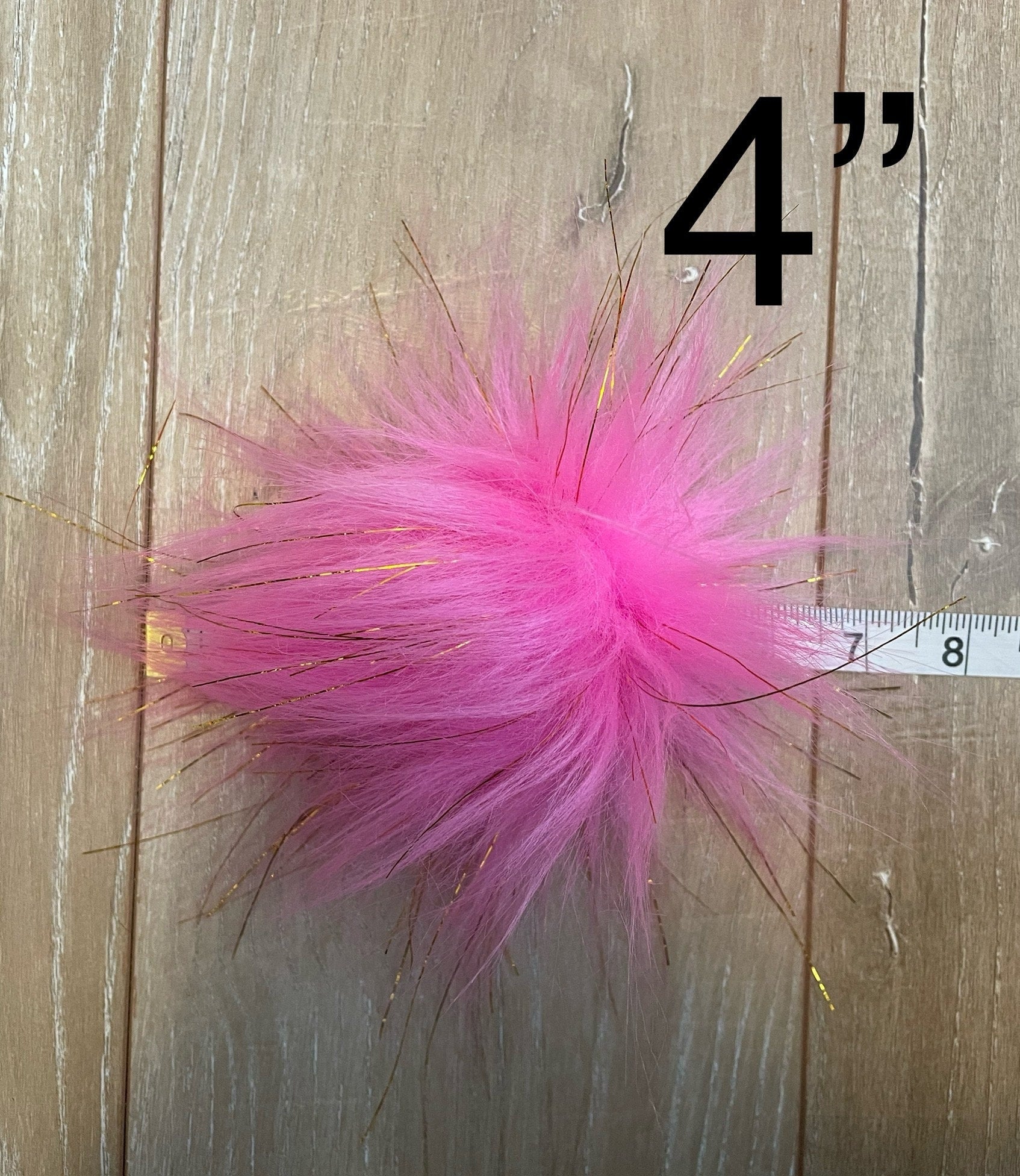 Bright pink with gold tinsel faux fur Pom Pom
