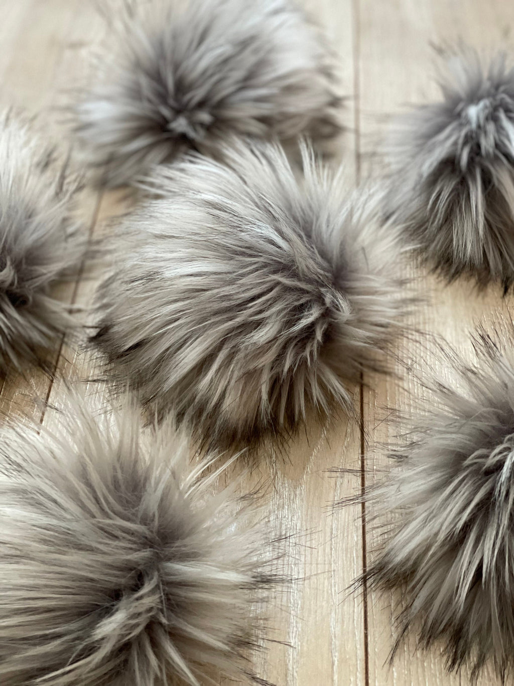 Grey wolf faux fur pom pom