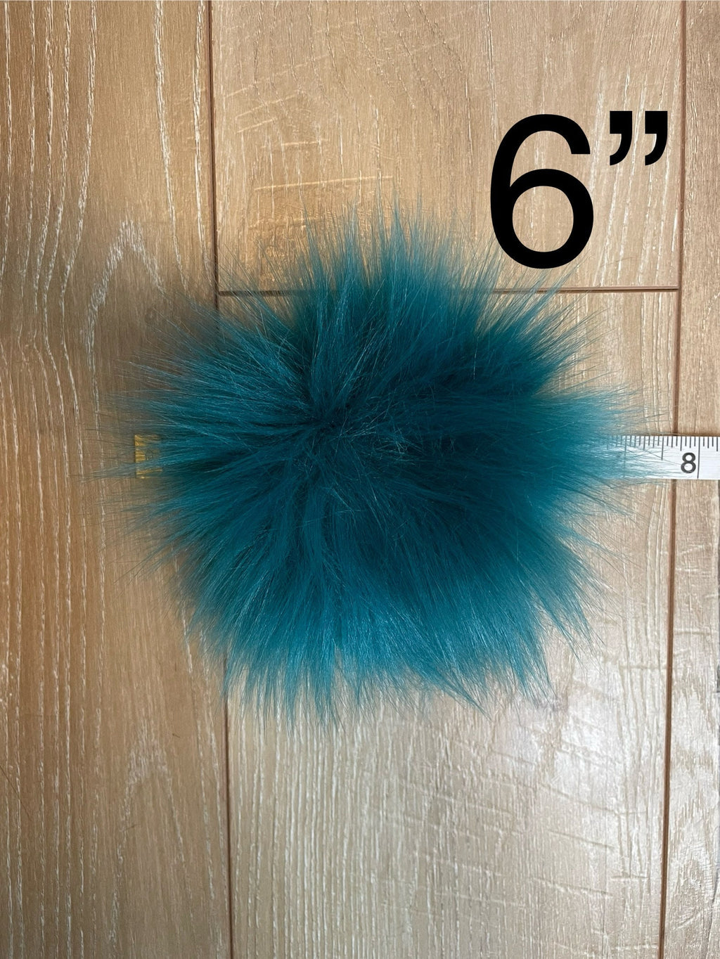 Teal faux fur Pom Poms