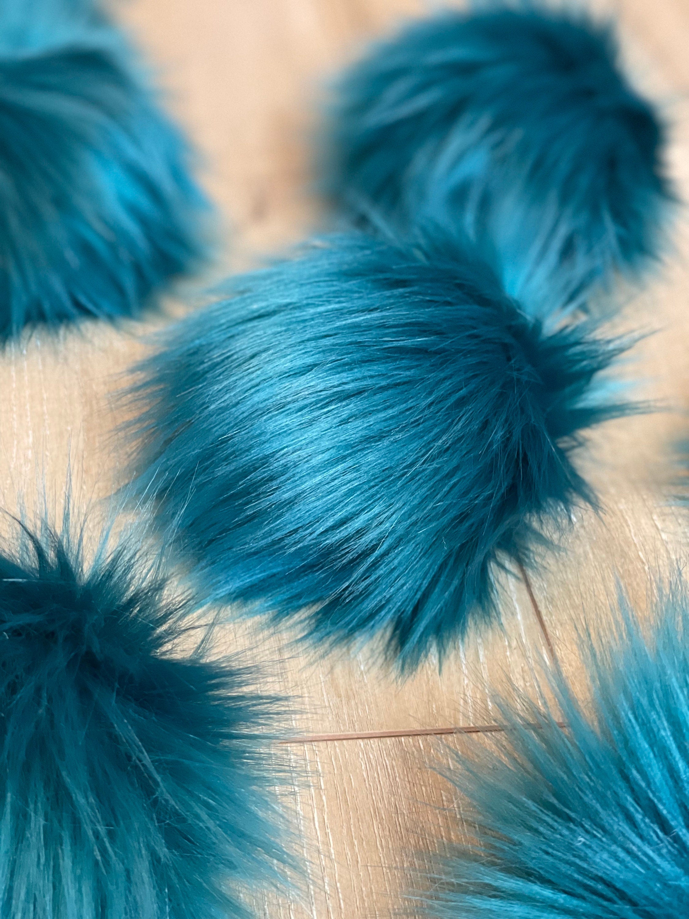 Teal faux fur Pom Poms