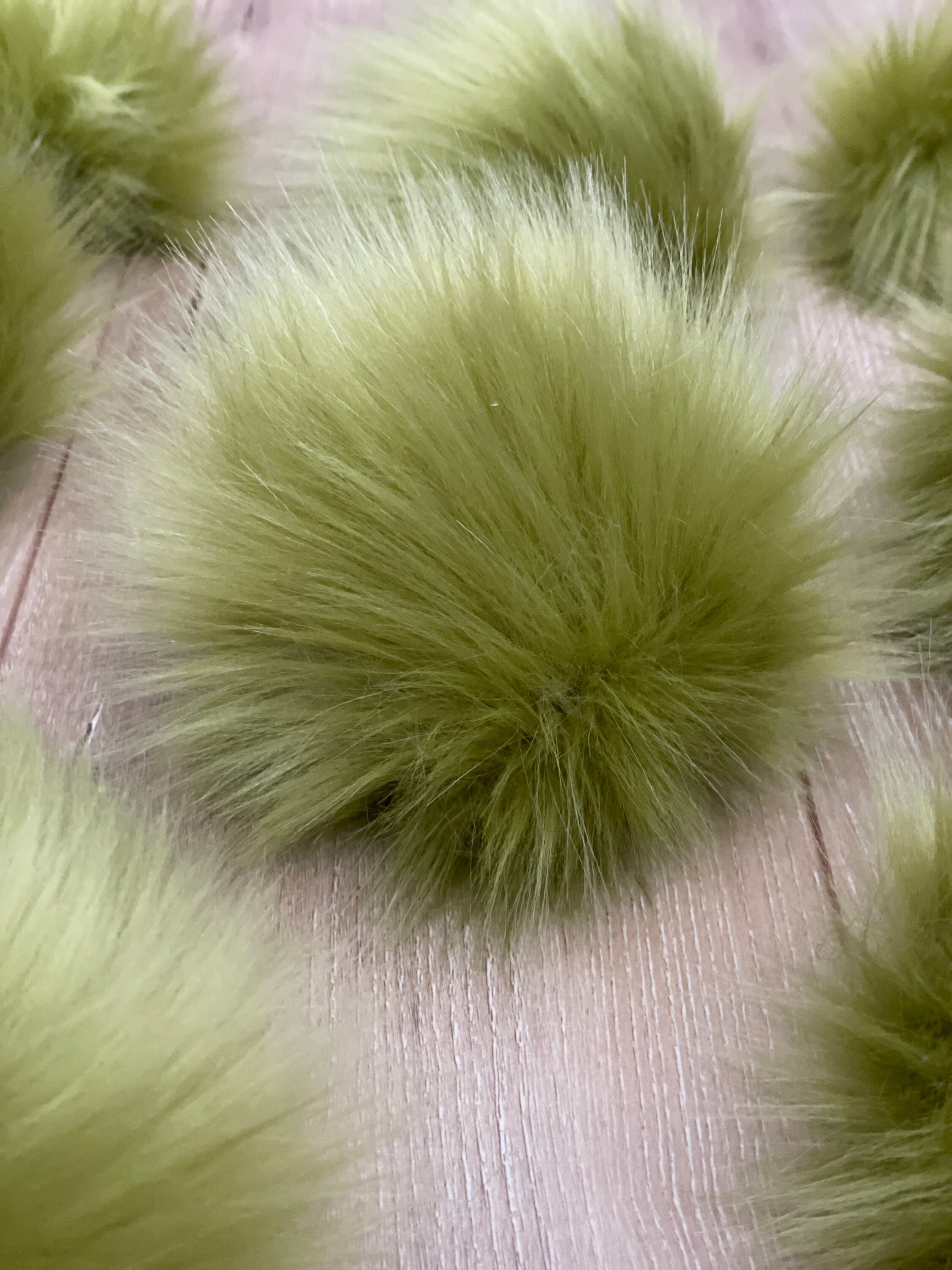 Olive faux fur Pom Pom