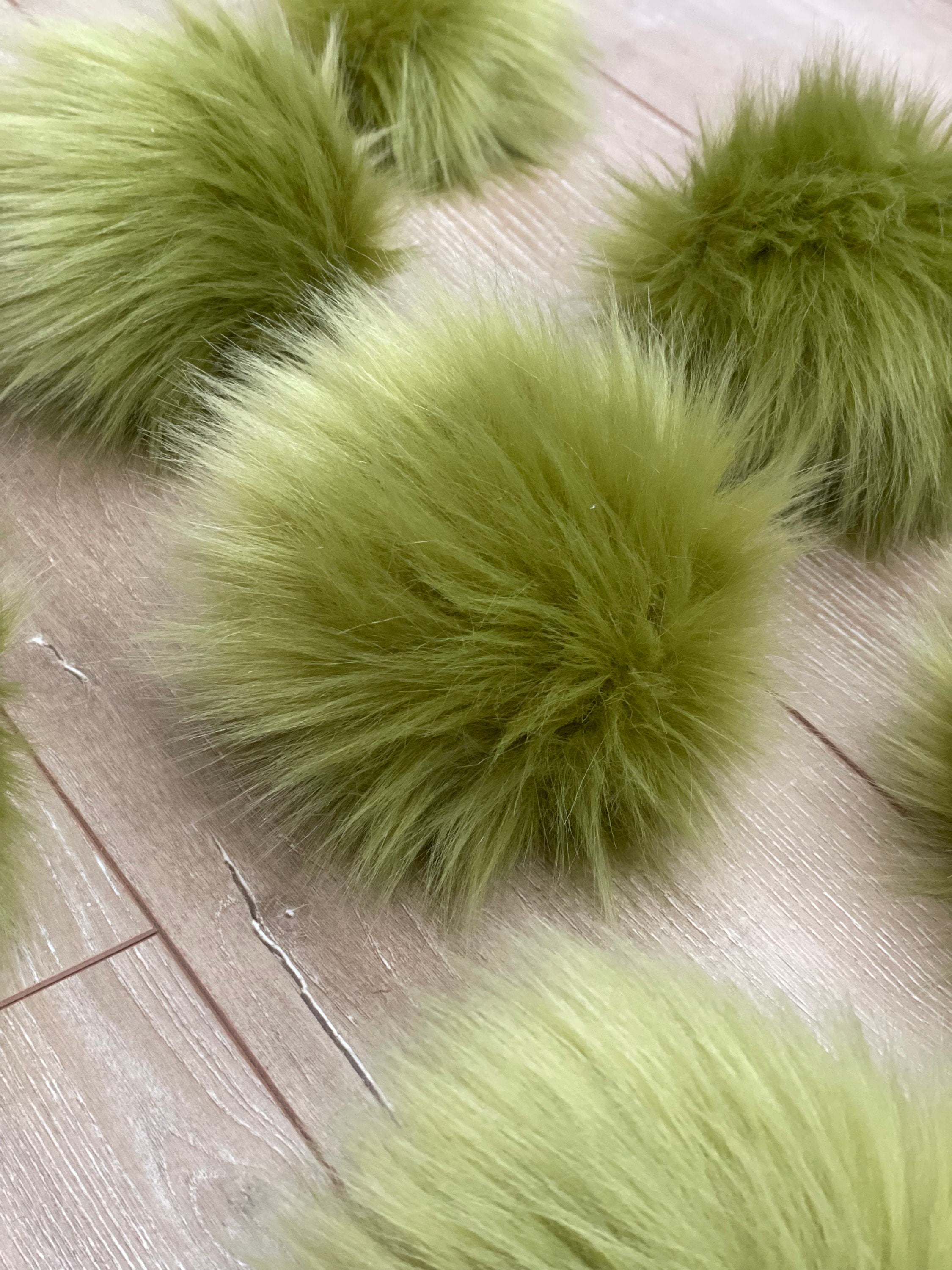 Olive faux fur Pom Pom