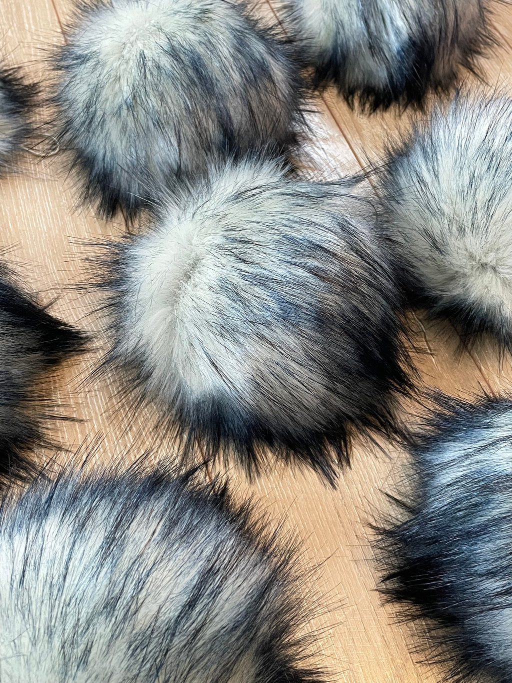 Navy tips luxe faux fur Pom