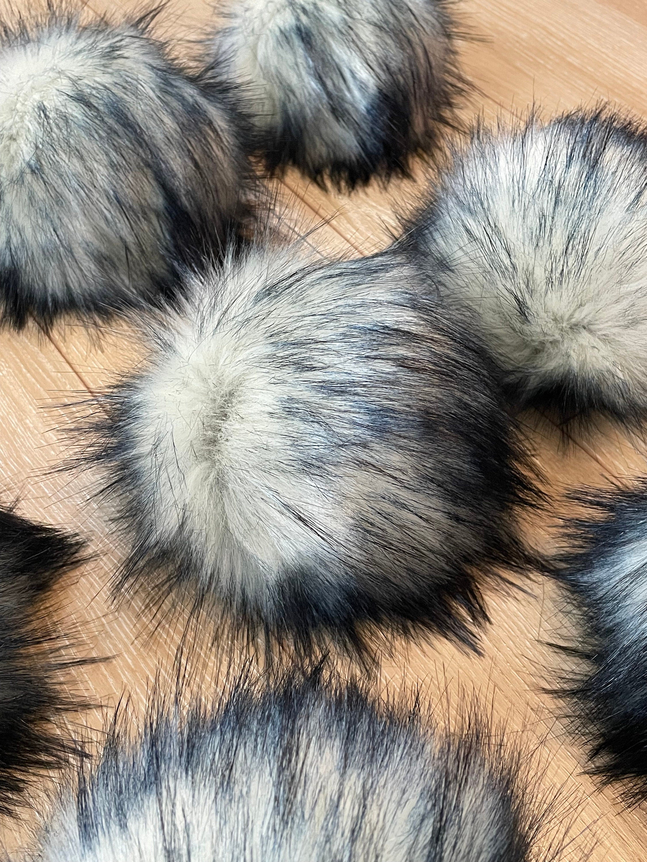 Navy tips luxe faux fur Pom