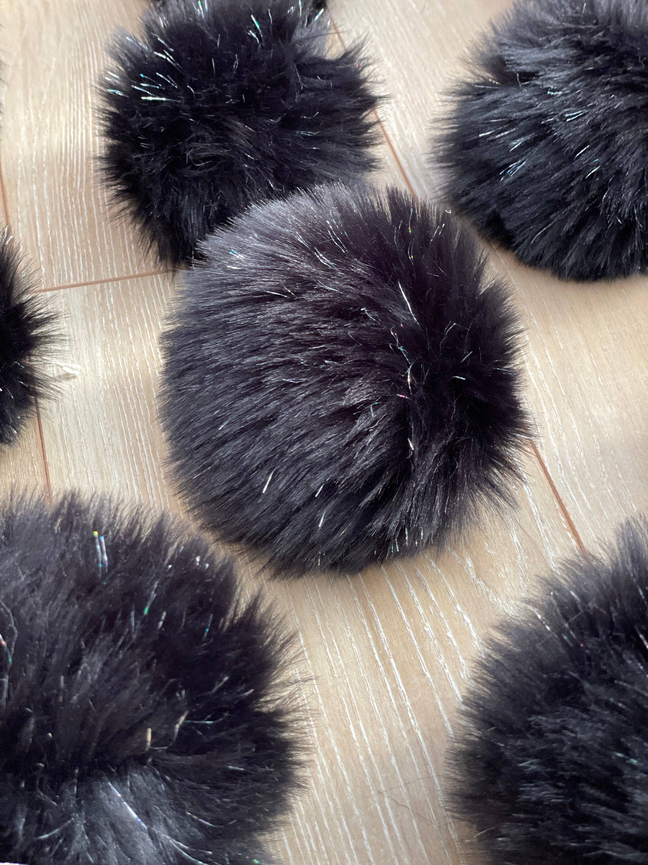 Black faux fur tinsel pom