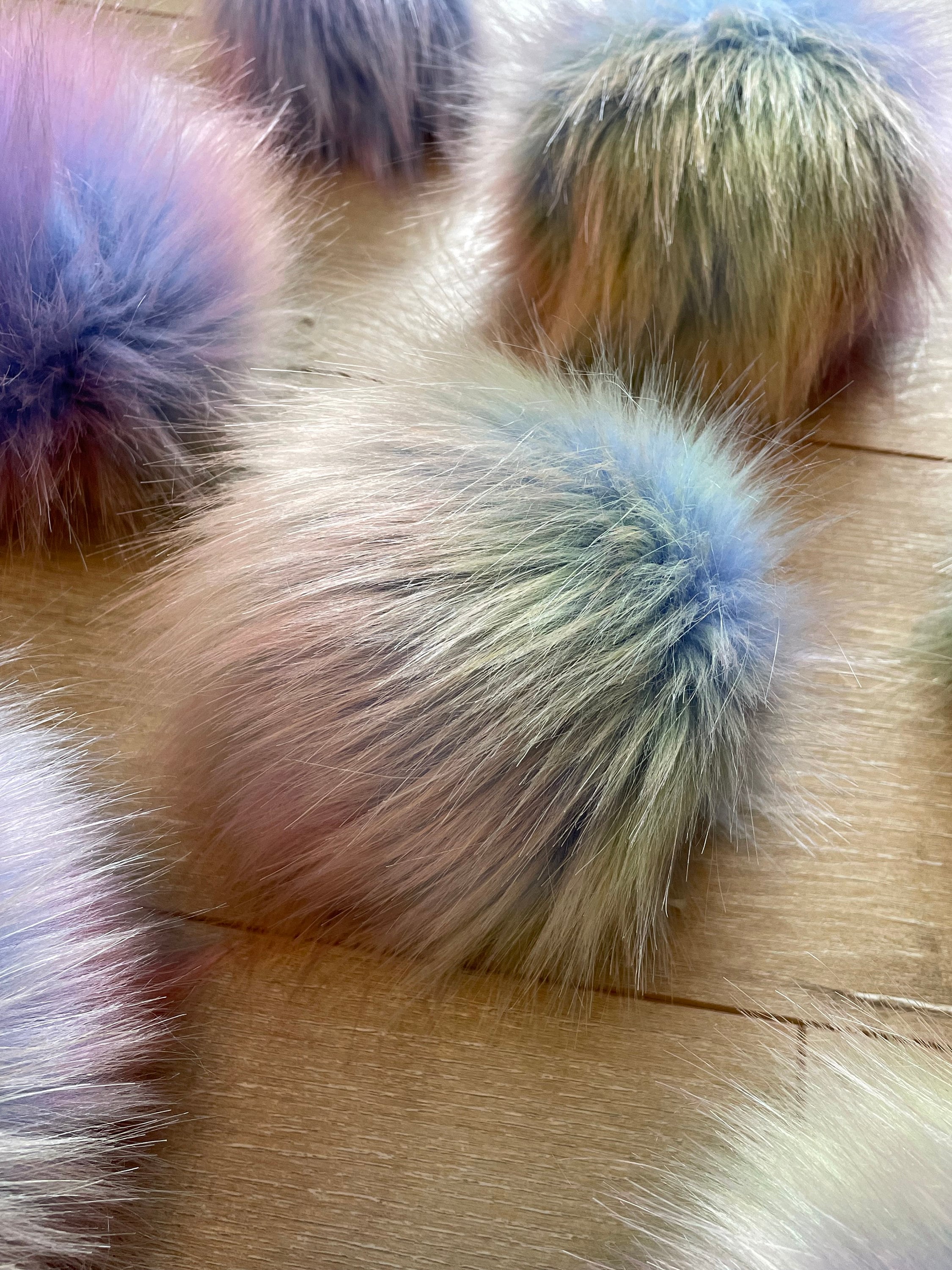 Opalescent luxe faux fur pom pom