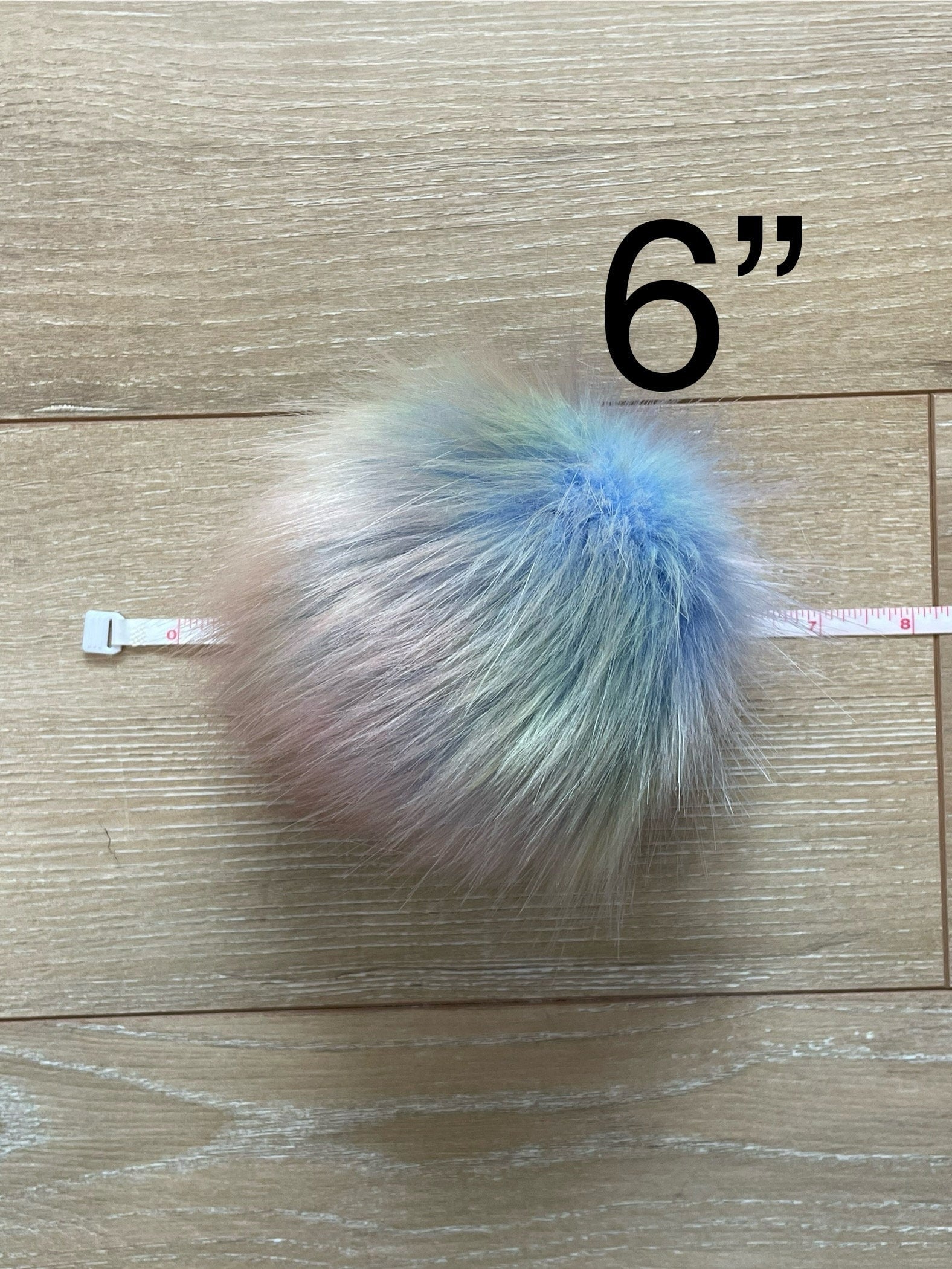 Opalescent luxe faux fur pom pom