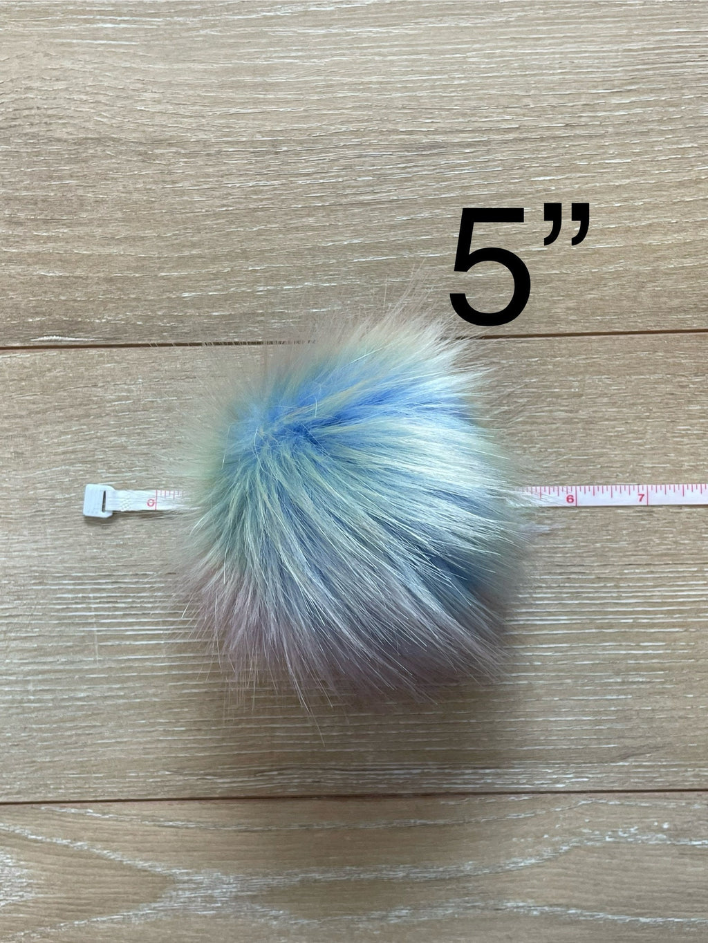 Opalescent luxe faux fur pom pom