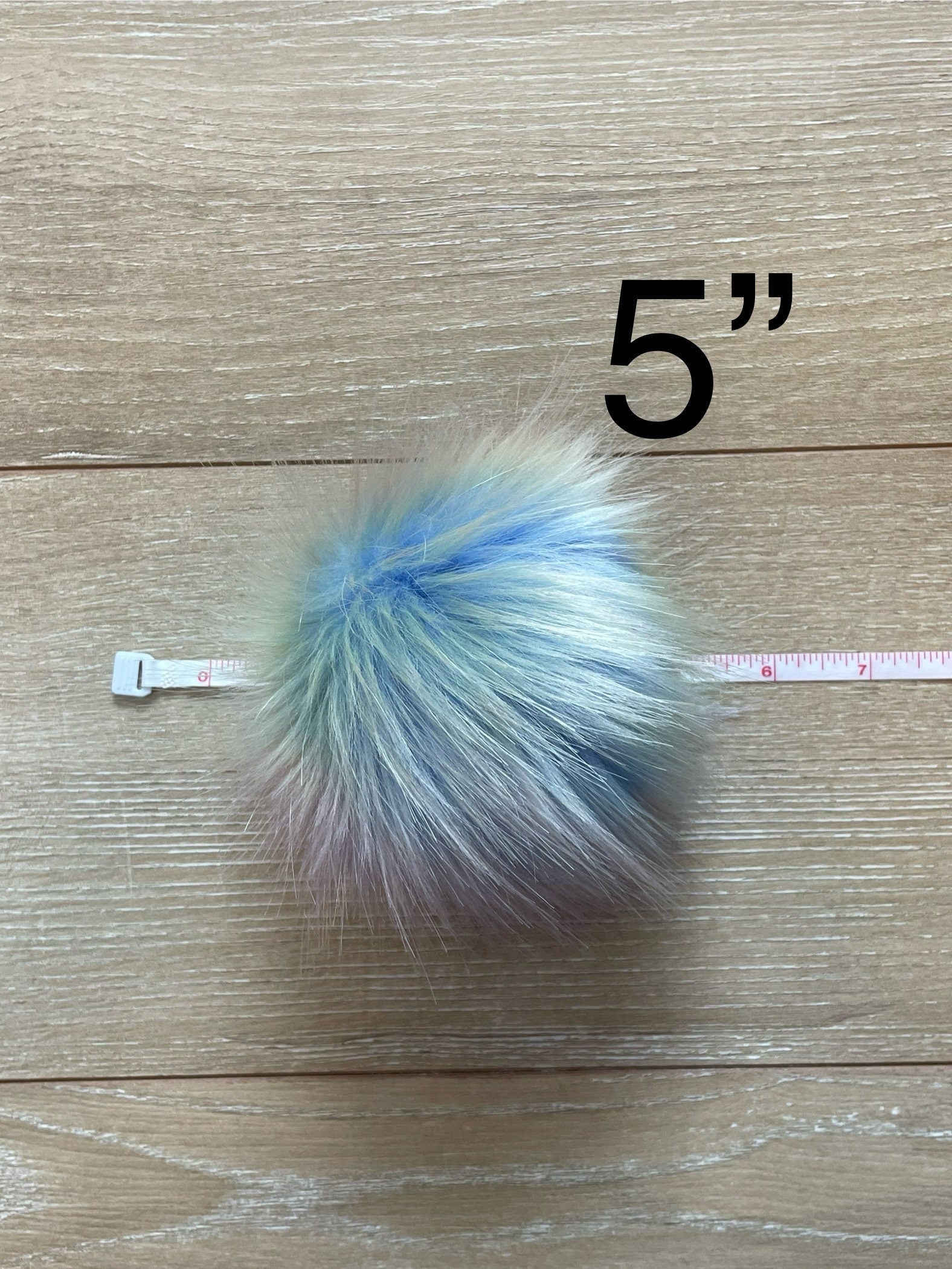 Opalescent luxe faux fur pom pom