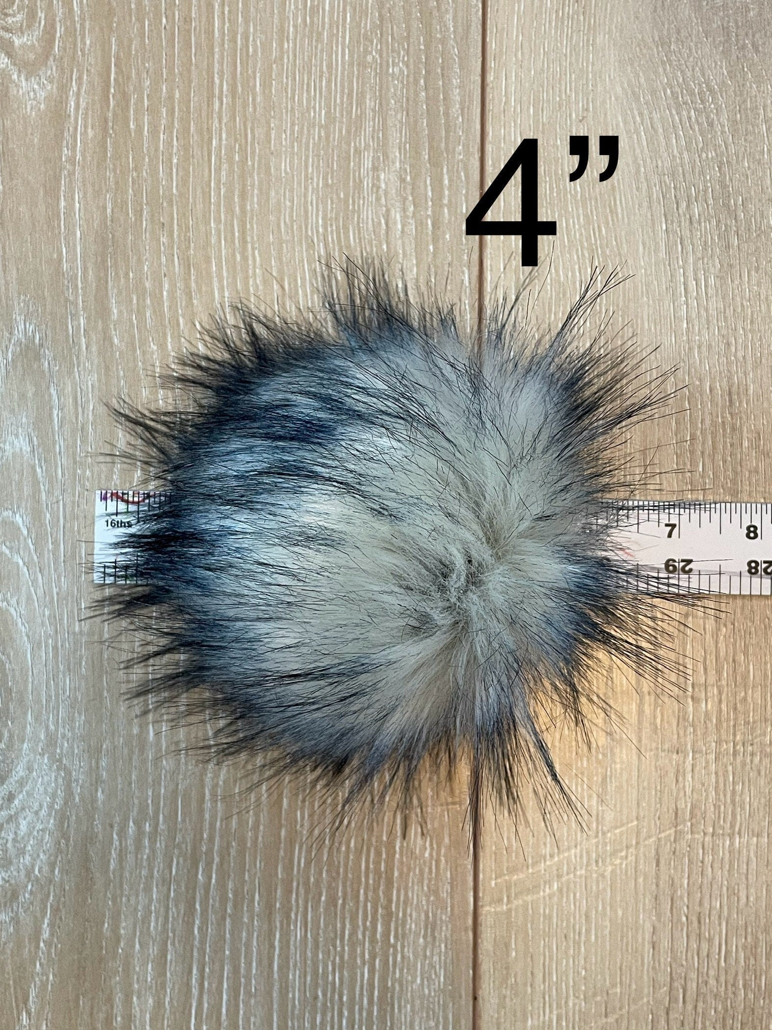 Navy tips luxe faux fur Pom