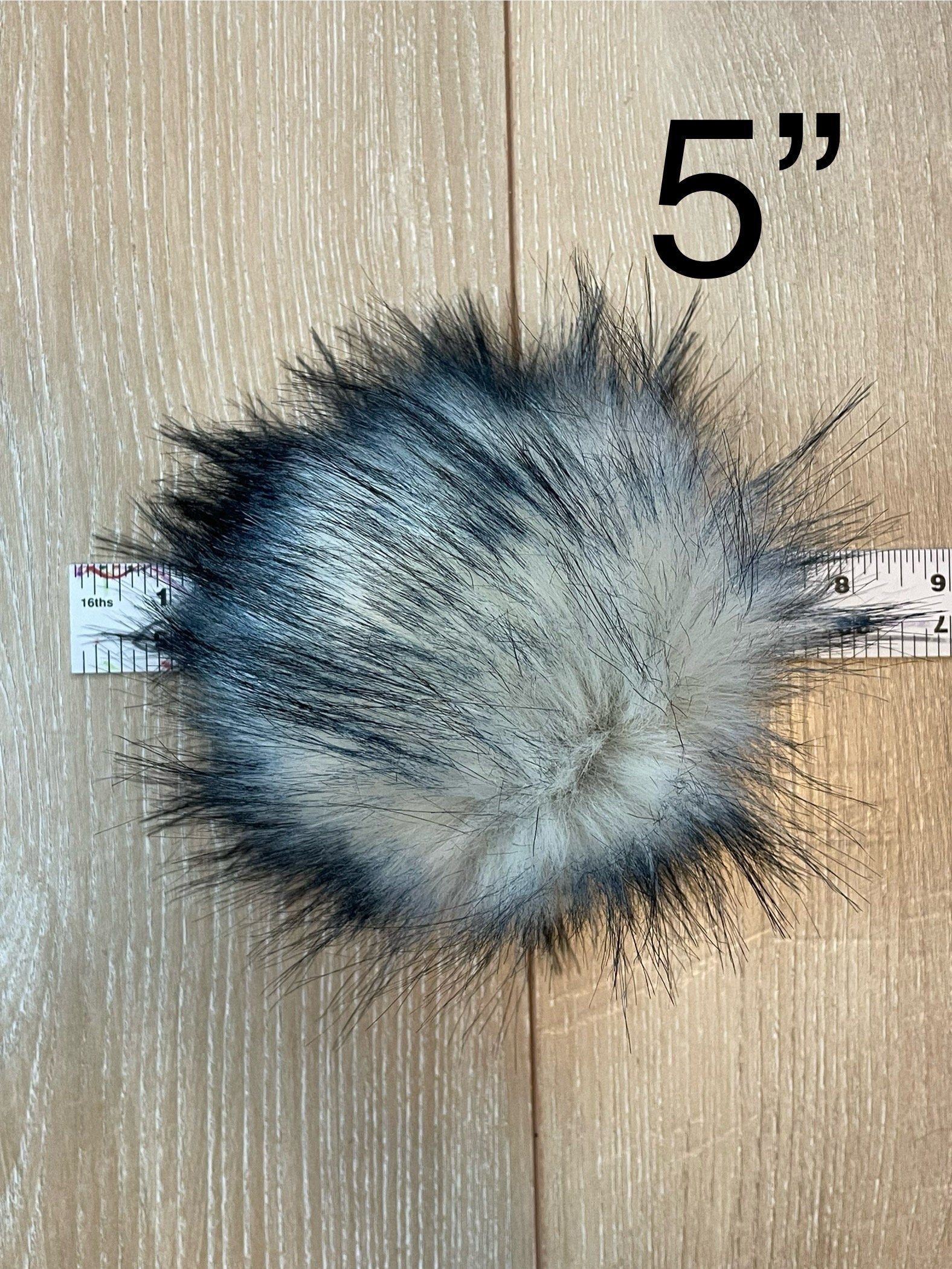 Navy tips luxe faux fur Pom