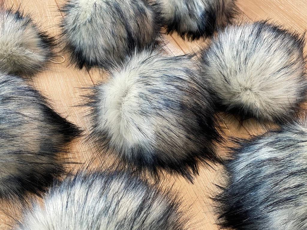 Navy tips luxe faux fur Pom