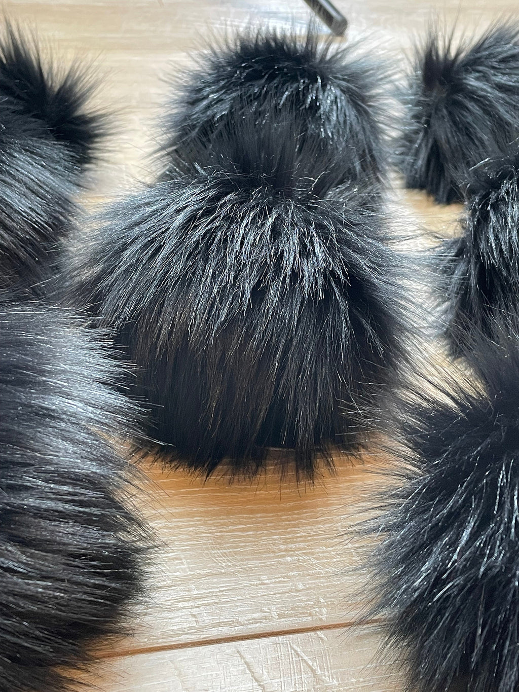 Black fluff faux fur pom pom