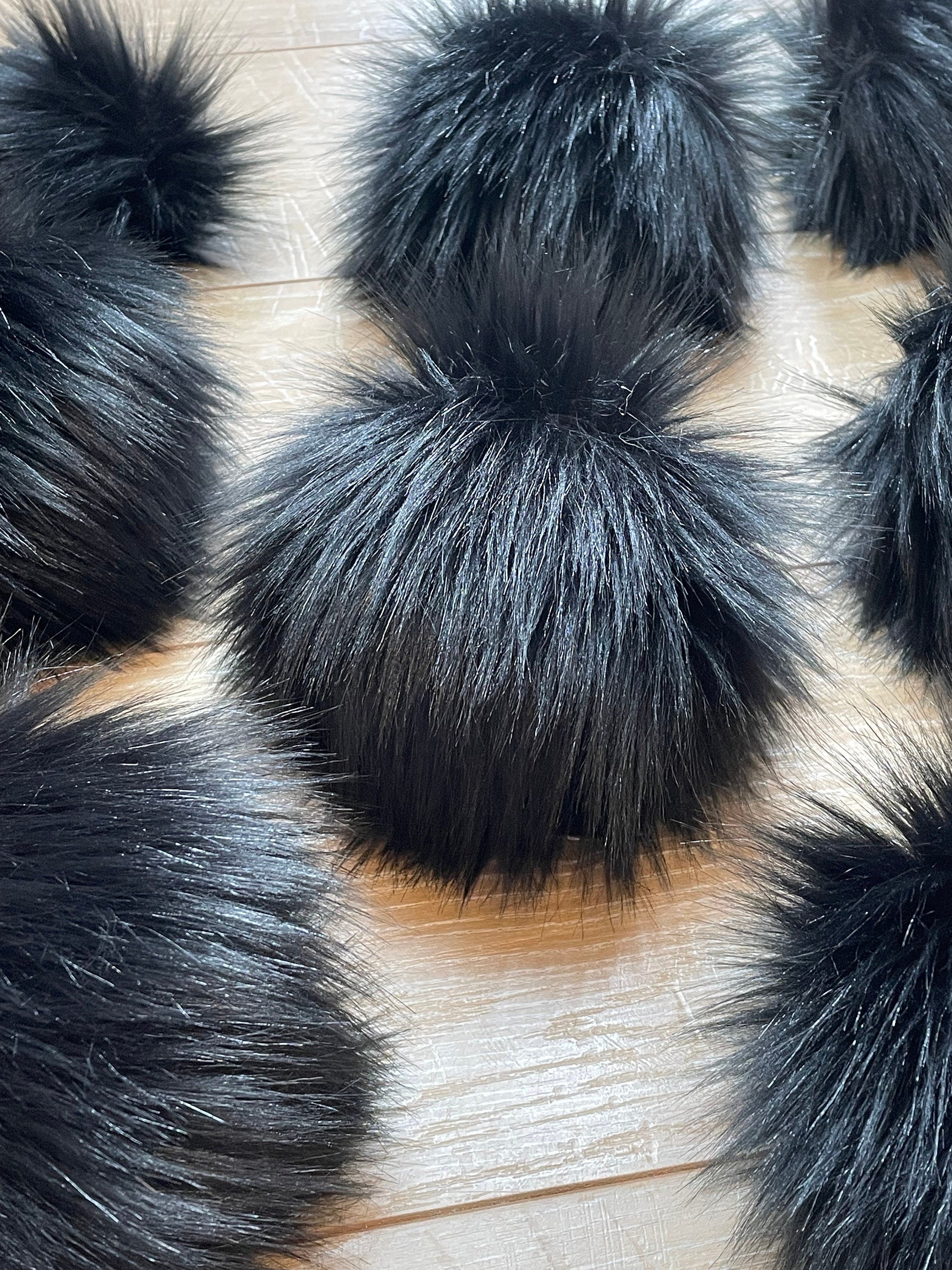 Black fluff faux fur pom pom
