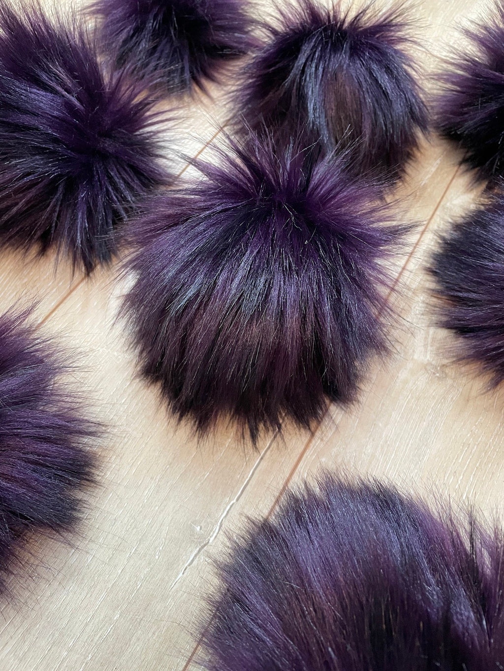 Black cherry faux fur pom pom
