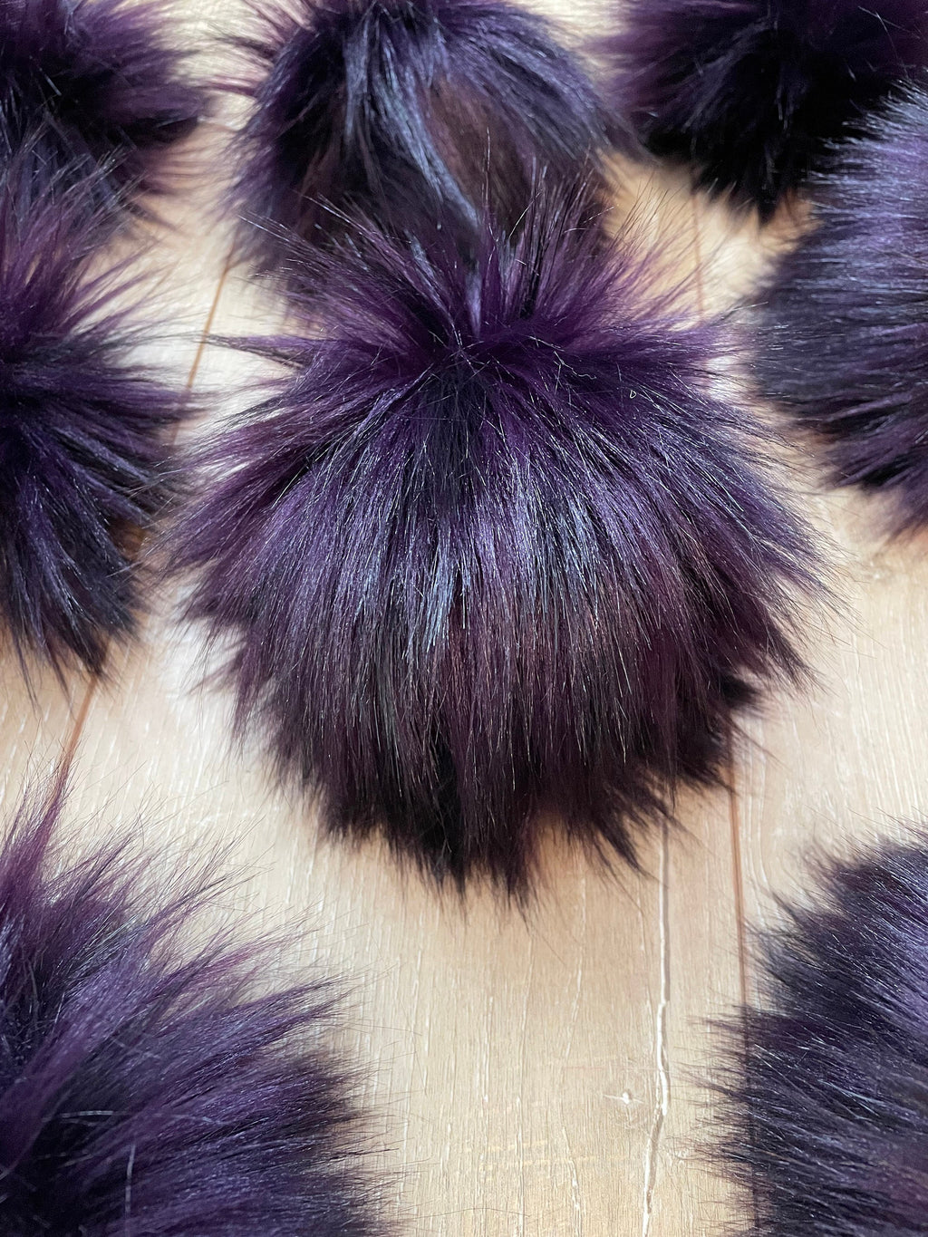 Black cherry faux fur pom pom