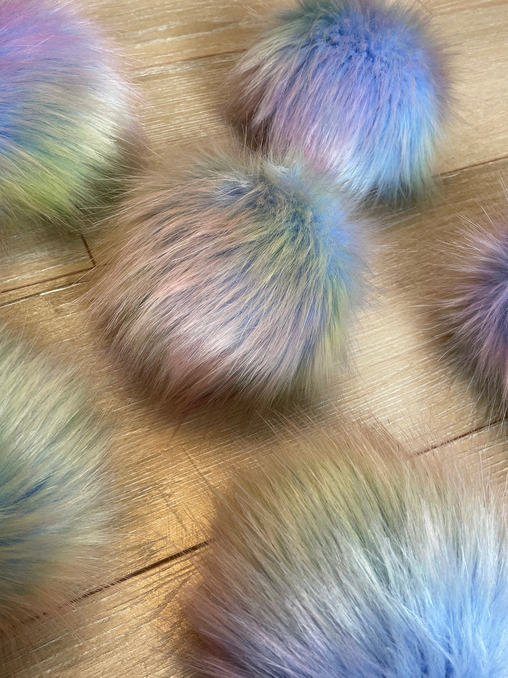 Opalescent luxe faux fur pom pom