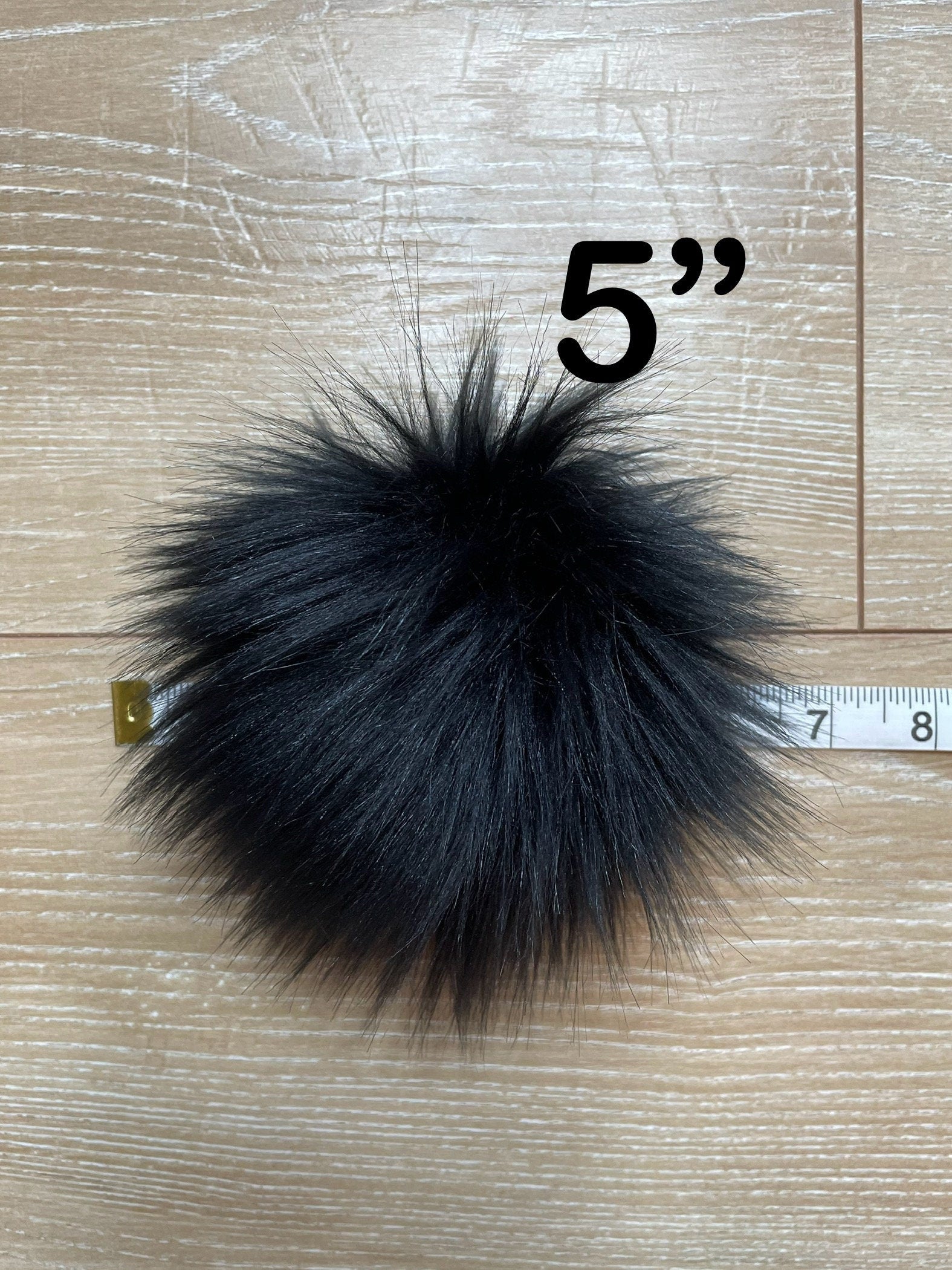 Black fluff faux fur pom pom